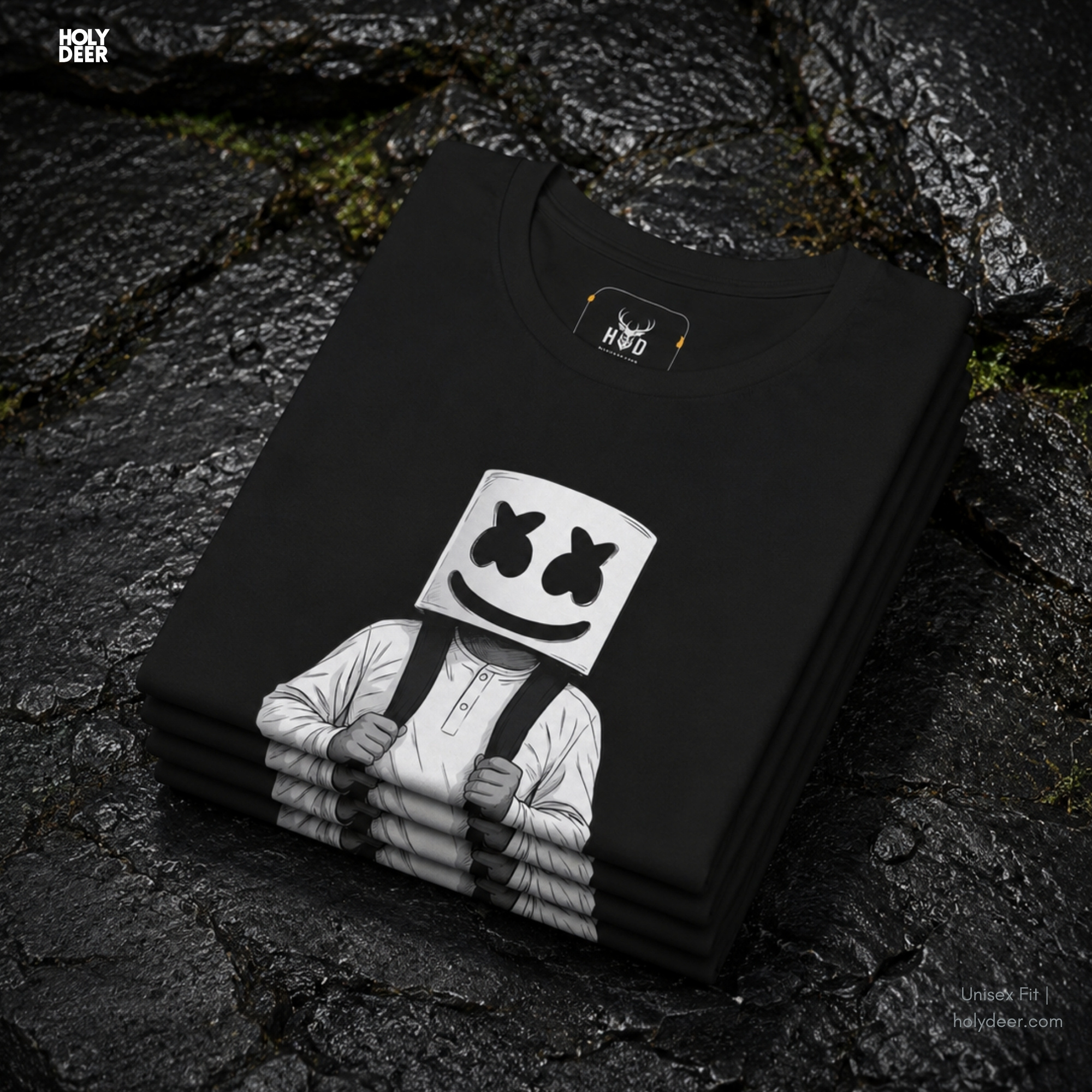 High-magnification print detail tracking the smooth black ink fills, crisp curved borders, and dense white background block forming the face of the marshmello graphic top.