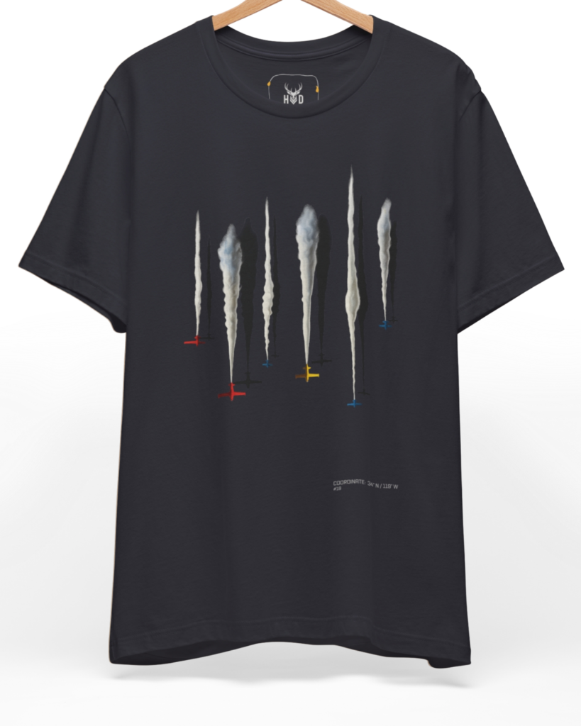 Premium Aerobatic Jets Tee displaying a high-detail smoke trail planes sequence and minimal aircraft tee concept on a heavy dark grey graphic canvas, designed by Holydeer Clothing.