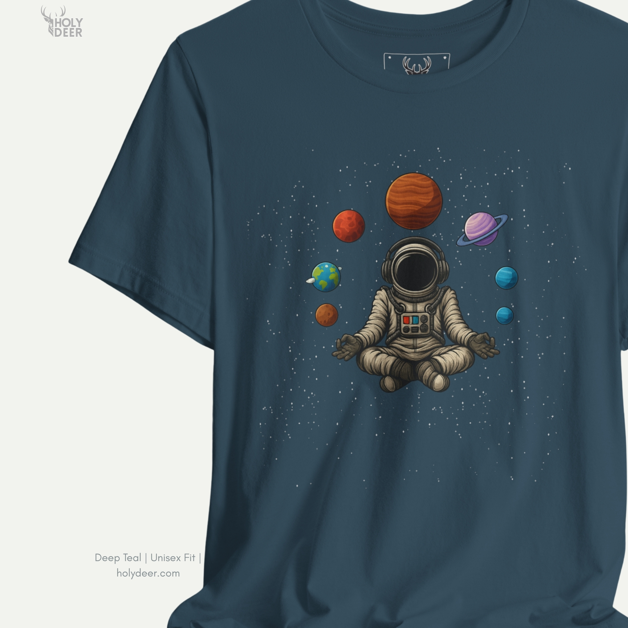 Macro view of the Astronaut Meditate print showcasing intricate ink shading on the white space suit control panels, ringed Satürn texture, and fine stars dust dust fields crafted exclusively by Holydeer Streetwear.
