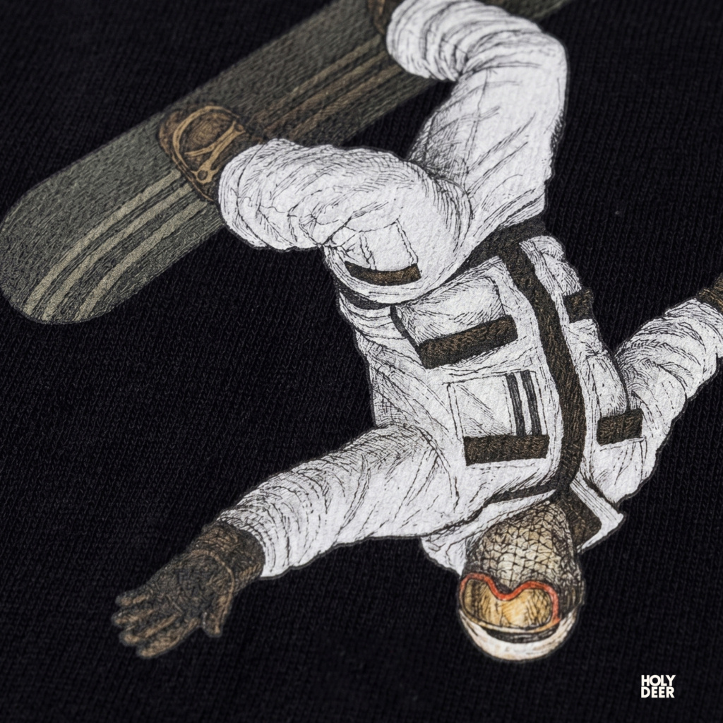 Macro view of the Backflip Snowboard print showcasing intricate shading on the thick winter tulum suit, matte black snowboard graphic, and fine action sport wear points crafted exclusively by Holydeer Streetwear.