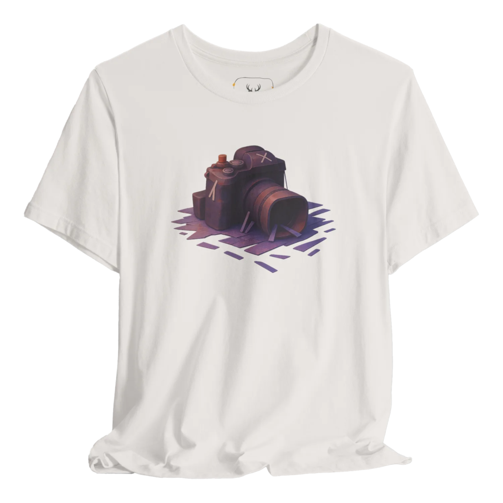 Artistic camera t-shirt designed for photography enthusiasts featuring a creative graphic print, perfect for anyone passionate about capturing moments. Made from soft cotton for comfort, this unique t-shirt is ideal for artists and photographers alike, making it a stylish addition to any wardrobe.
