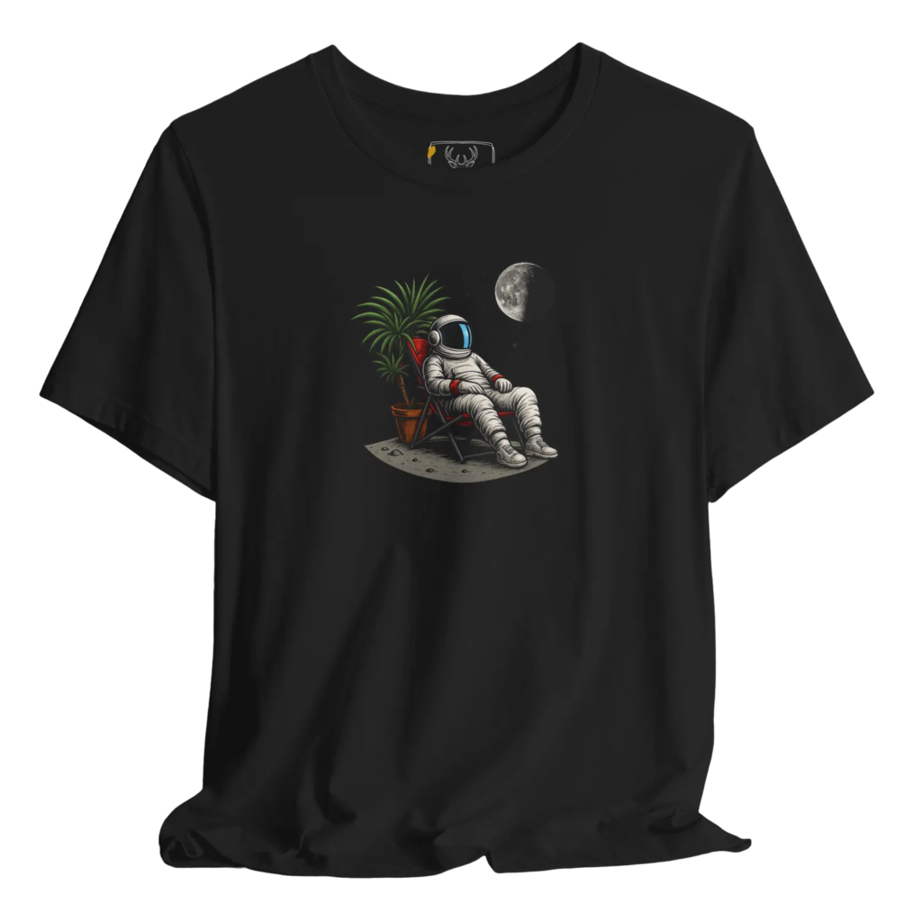Stylish astronaut graphic t-shirt featuring a cosmic design, perfect for those who love space-themed apparel. This unique inspirational graphic tee is ideal for dreamers and adventurers, showcasing a comfortable and trendy fit.