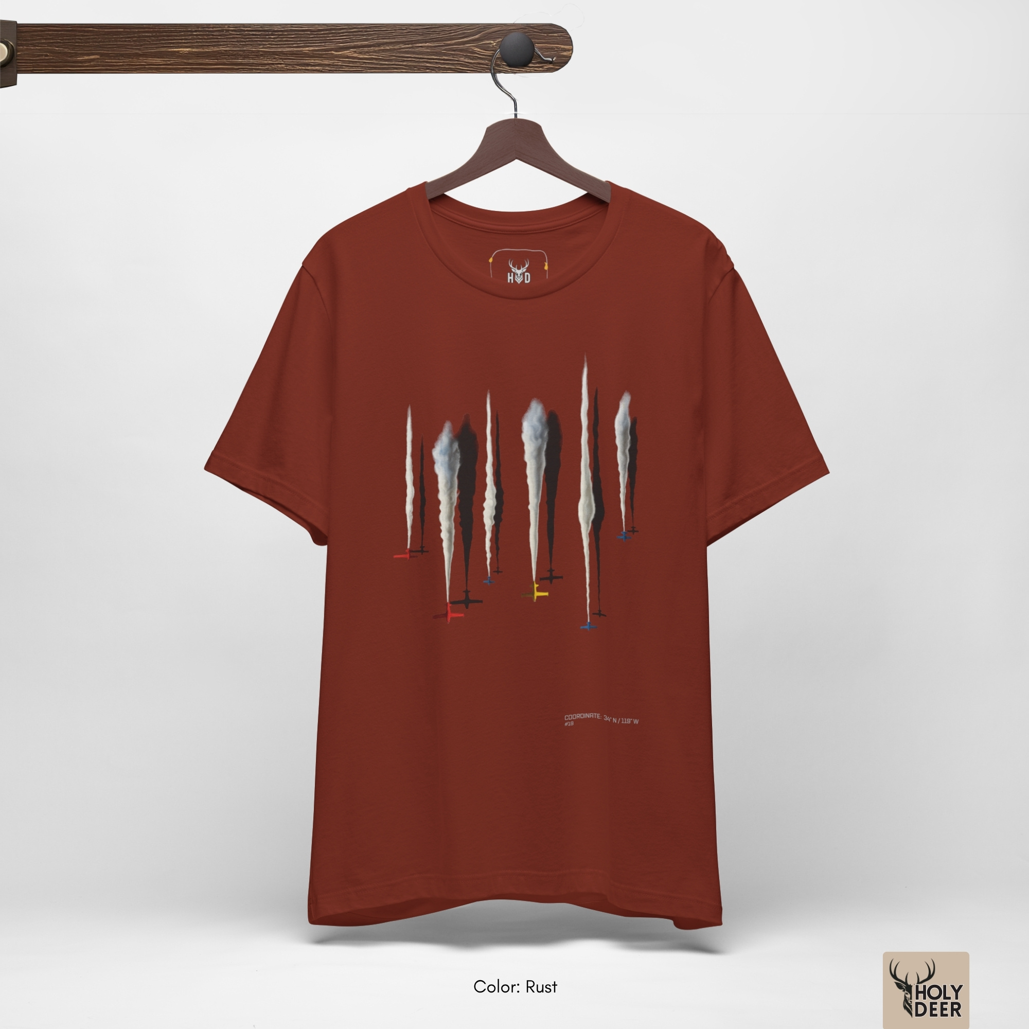 Industrial airfield concrete architecture outdoor lifestyle model wearing the centered Aerobatic Jets Tee from Holydeer Clothing, standing as a high-end airshow planes tee statement matching elite minimal aircraft tee trends.