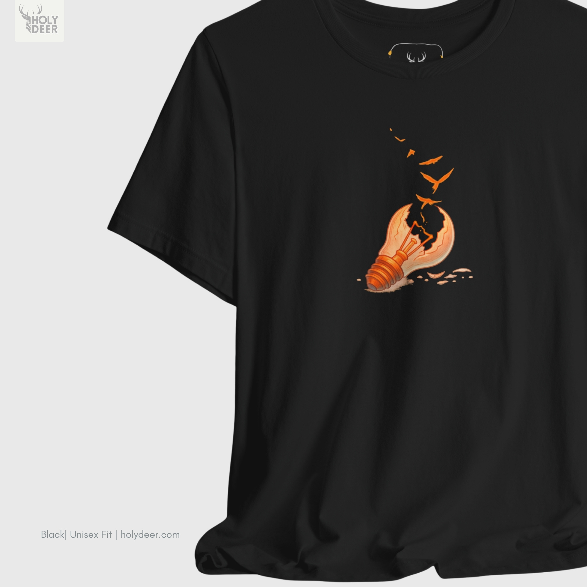 Soft dramatic shadow studio backdrop framing the unique Freedom Tshirt by Holydeer Streetwear, magnifying the clean off-centered abstract freedom placement and premium think free shirt presentation.