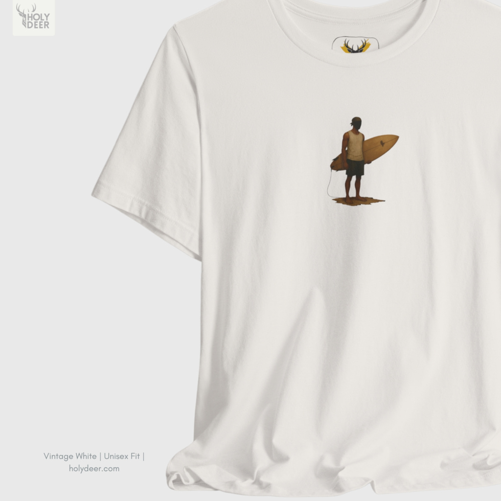 Soft amber sunset ray shadow studio backdrop framing the unique Retro Surfer Shirt by Holydeer Streetwear, magnifying the clean off-centered surfboard graphic placement and premium indie surfer gift presentation.