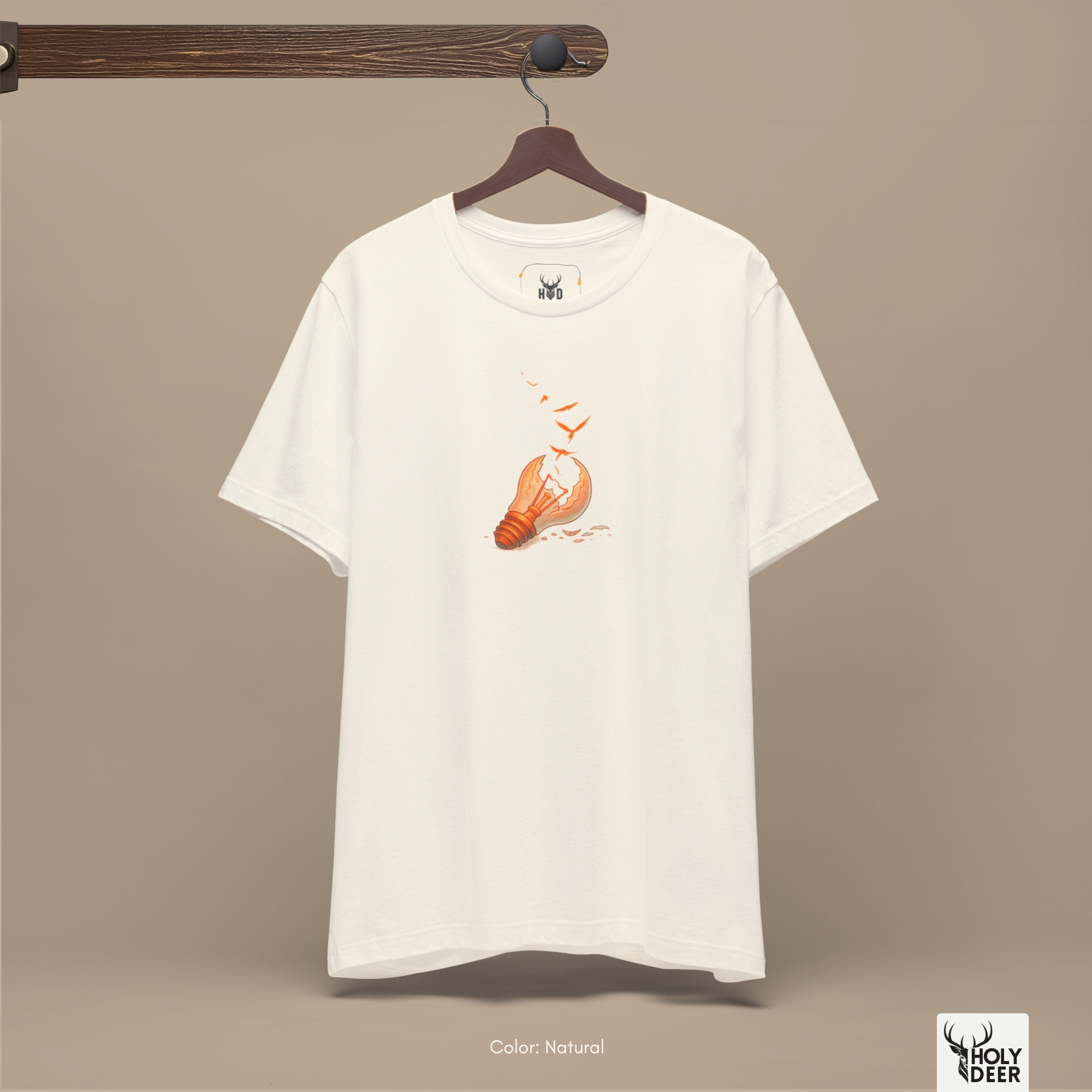 Angled perspective of the premium screen-printed Freedom Tshirt, detailing the thick paint feel of the erupting bird horizon and copper bulb base lines, center-right layout placement, and the signature holydeer tee high-contrast design.