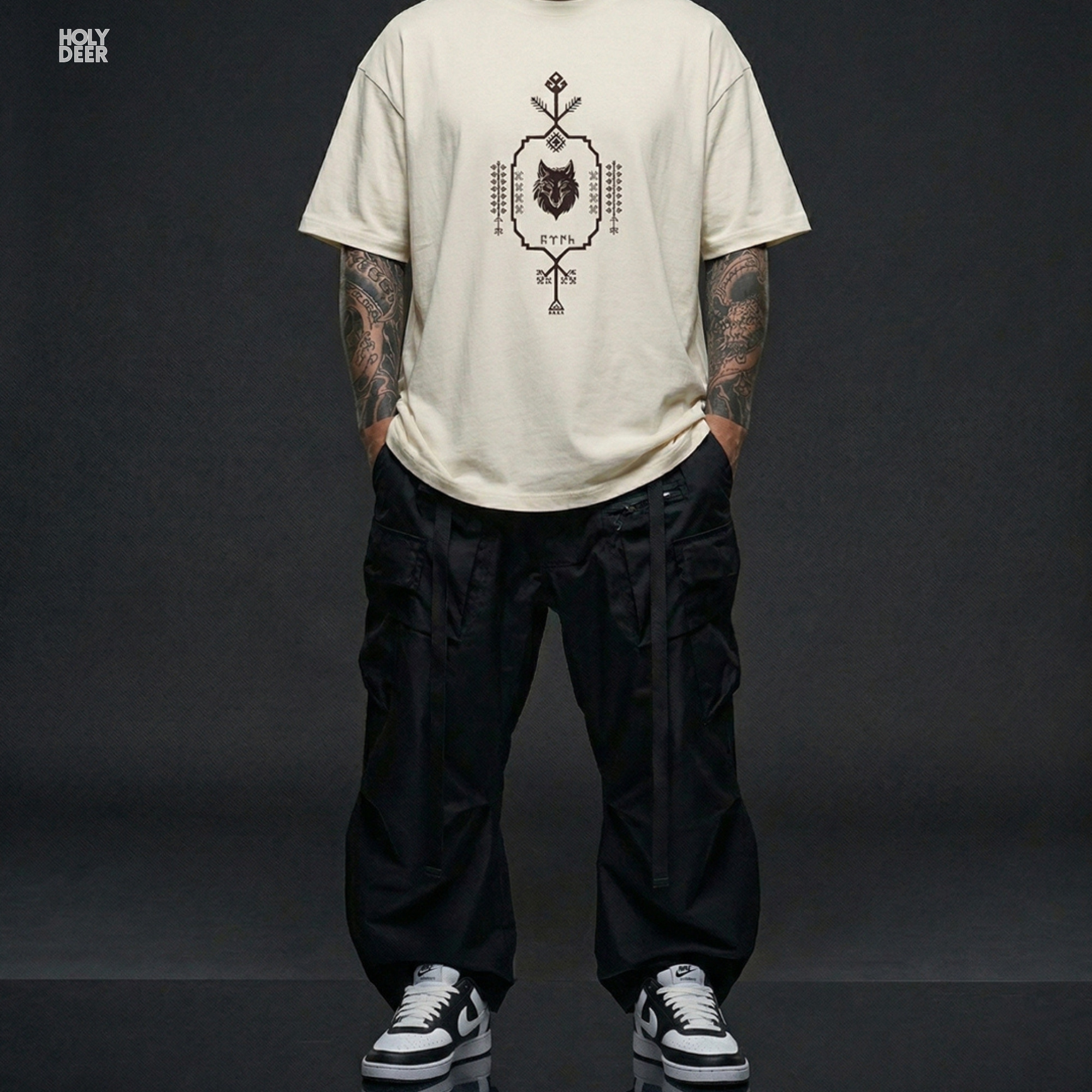 Detailed macro perspective displaying the linear runic letter blocks, geometric angles, and rich ink distribution translating to Turk on the turkic art tee panel.