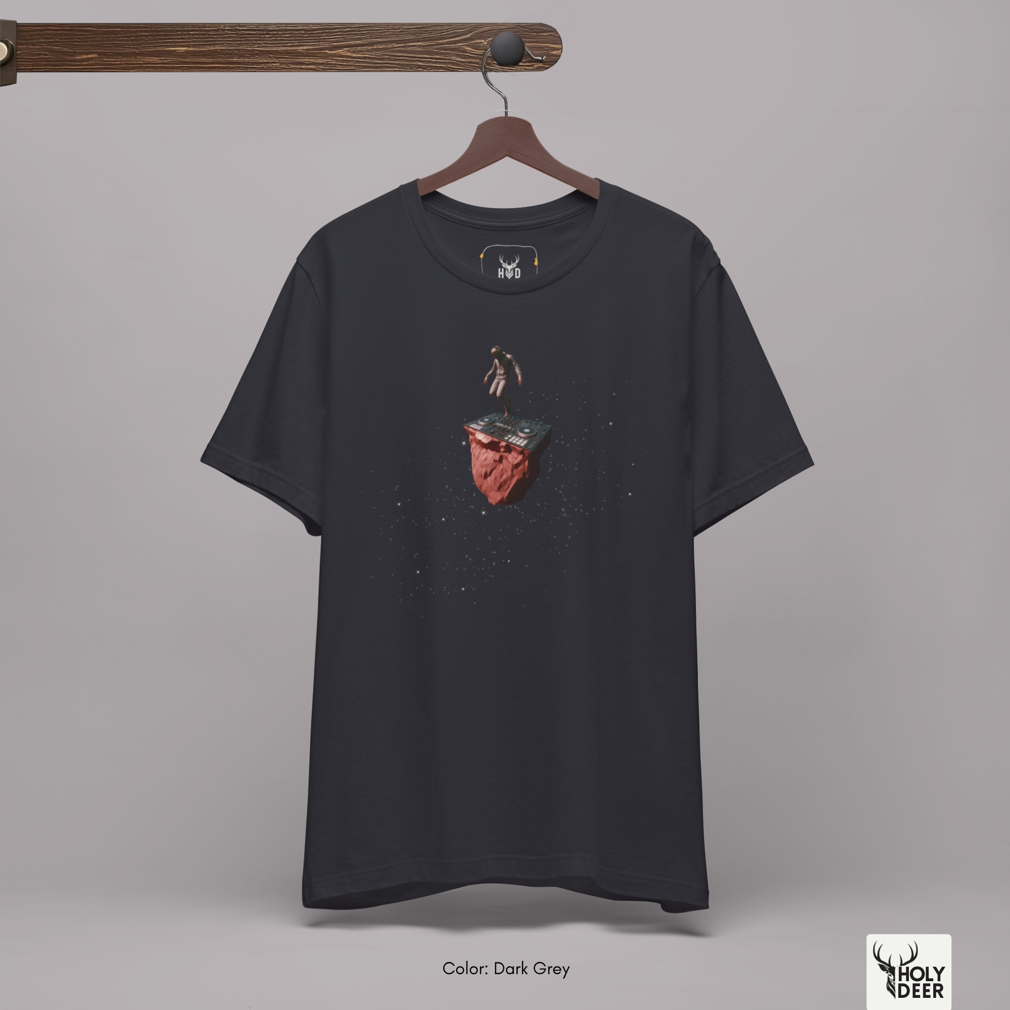 Angled perspective of the premium screen-printed Techno Rave Tshirt, detailing the thick paint feel of the dancing dj performance character silhouette, centered cosmic layout placement, and the signature holydeer tee high-contrast design.