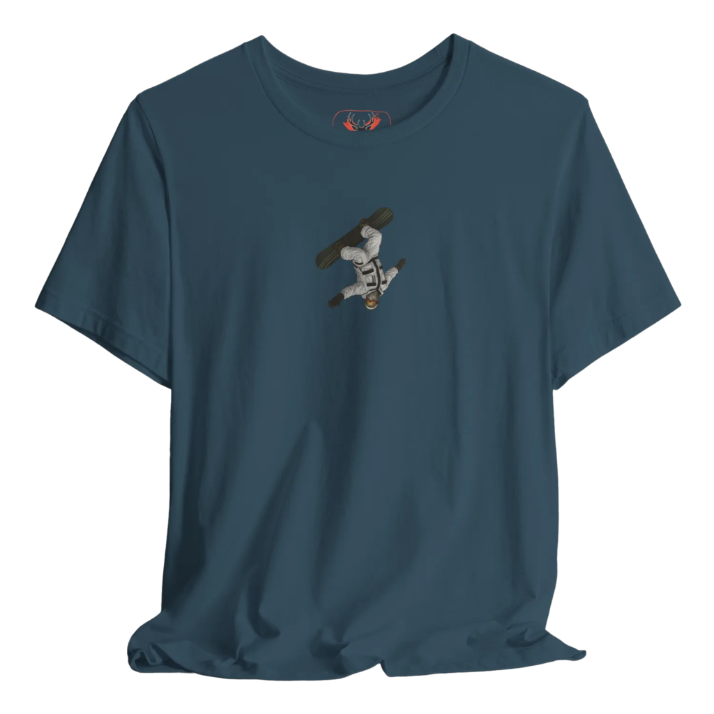 Blue t shirt featuring a detailed snowboarder performing a mid-air freestyle jump, perfect for snowboarders, snow park riders, ski resort visitors and winter sports enthusiasts who love downhill runs, mountain trips, resort weekends and extreme snowboarding streetwear. Ideal for cold weather riders seeking stylish snow gear and snowboarding graphic apparel.