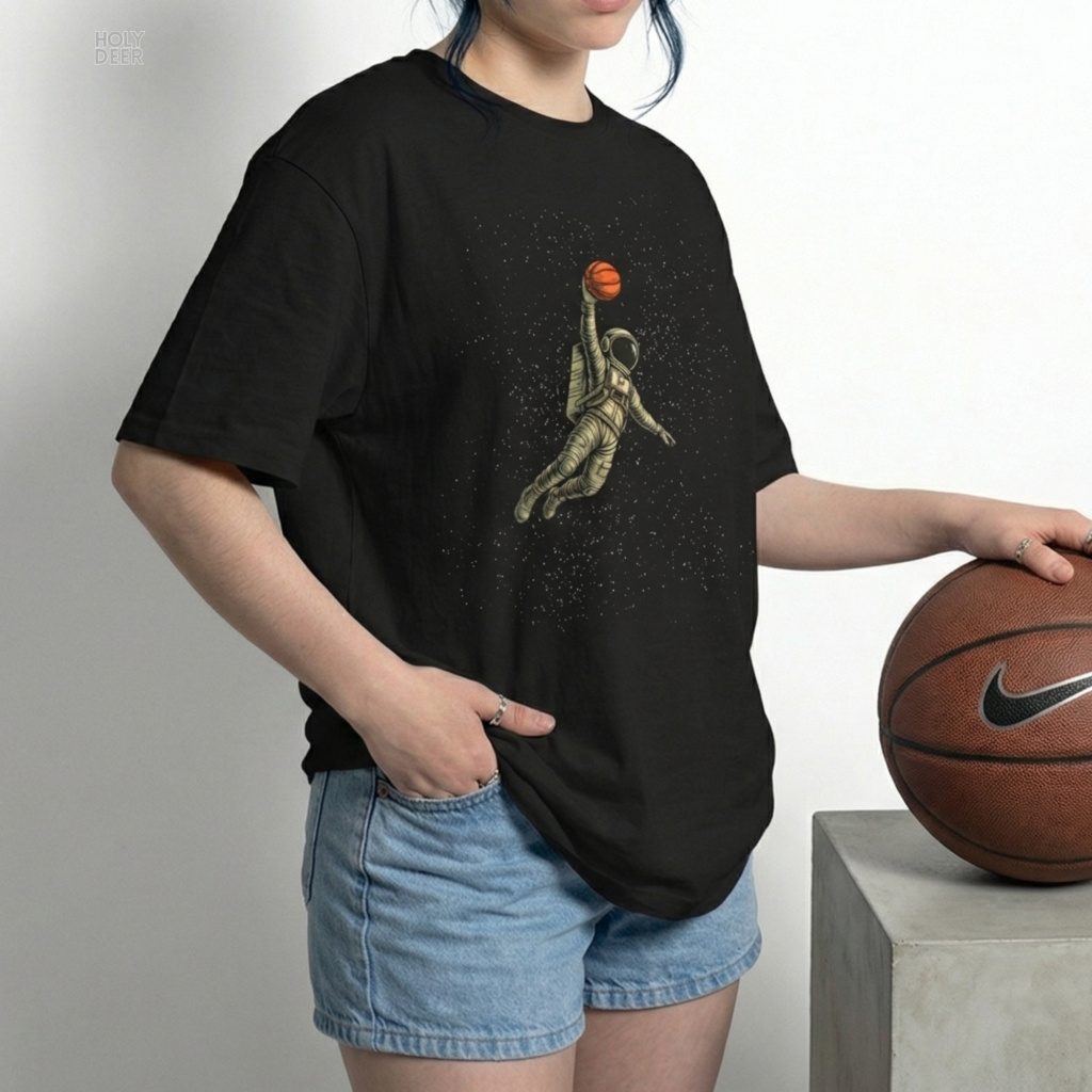 A candid industrial concrete underpass outdoor lifestyle photo featuring an alternative gamer wearing the official Cyberpunk Basketball by Holydeer Clothing, blending seamlessly into raw techwear graphic and dynamic future athlete tee settings.
