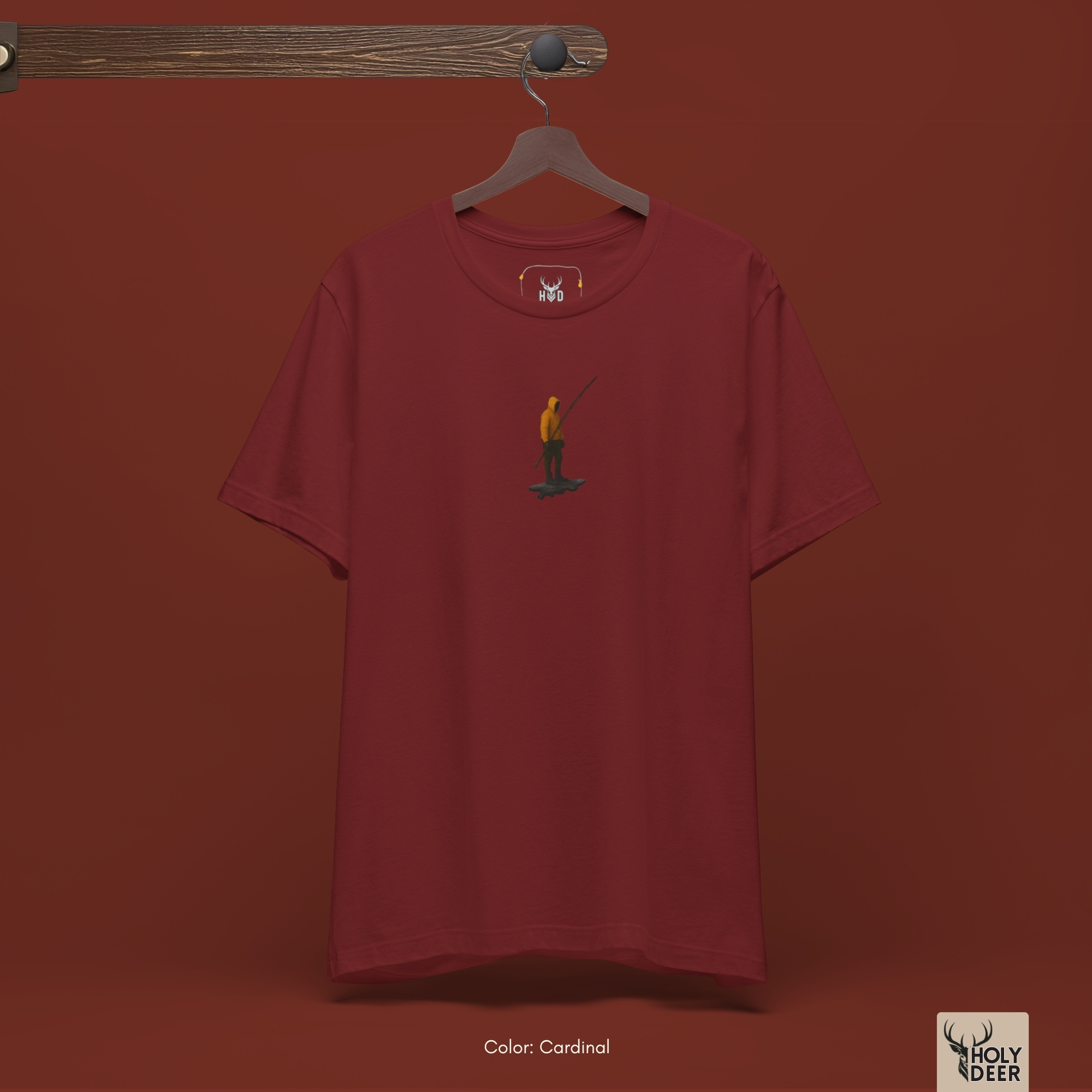 Professional flat lay photography of the Minimalist Fish Tee by Holydeer Apparel, arranged cleanly next to retro brass fly fishing reels, weathered maritime charts, and outdoor hobby top essentials.