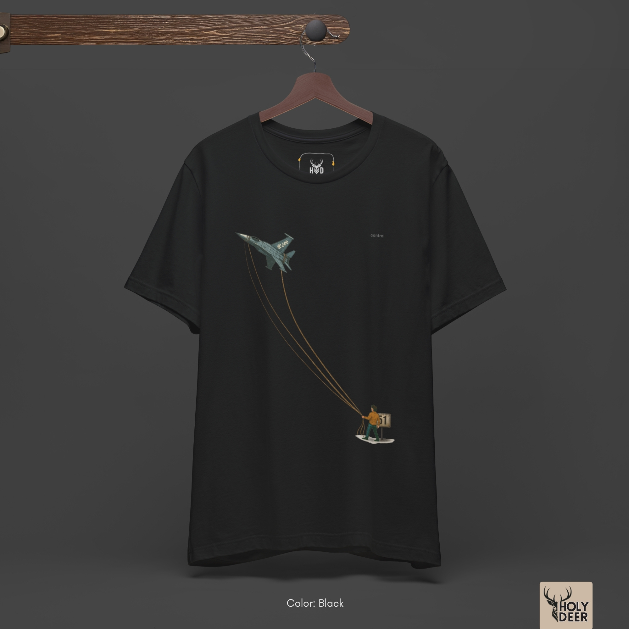 Soft dramatic shadow studio backdrop framing the unique Freedom Shirt by Holydeer Streetwear, magnifying the clean centered surreal freedom tee placement and premium pilot graphic tee presentation.