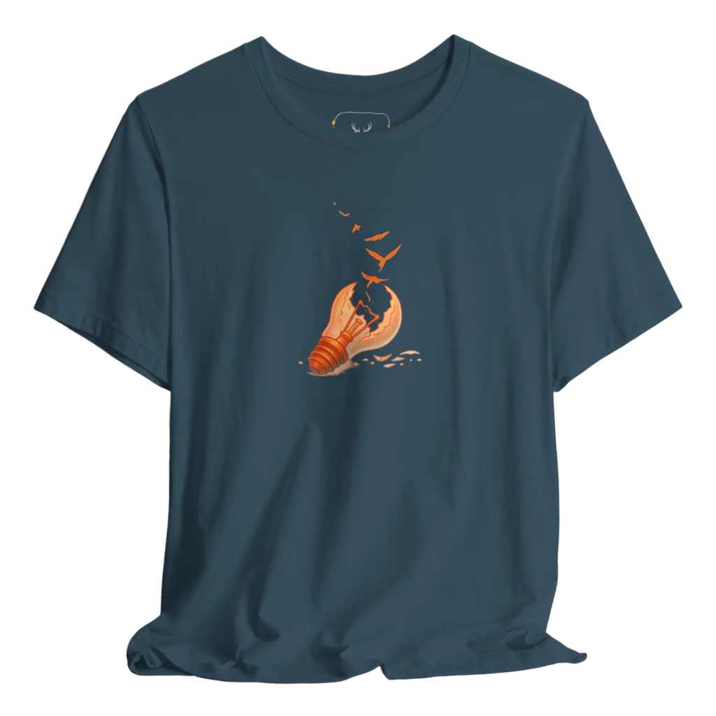 Deep teal t shirt featuring a symbolic light bulb releasing flying birds, representing creative ideas, artistic freedom, and philosophical thinking. Ideal for artists, designers, and creative people who enjoy surreal minimal graphics and concept illustration in streetwear style.