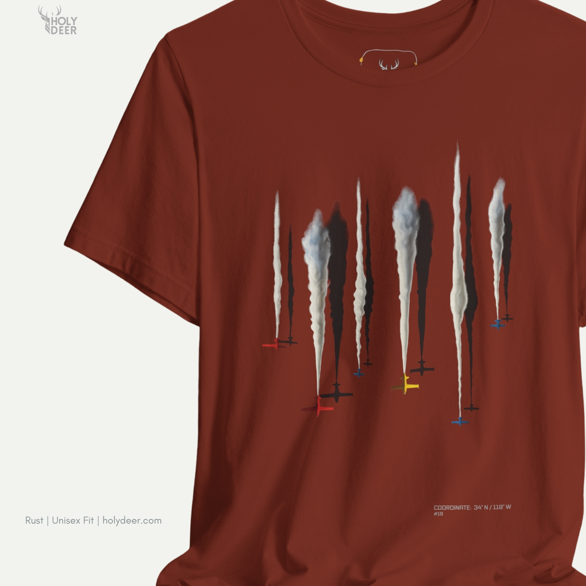Professional flat lay photography of the Aerobatic Jets Tee by Holydeer Apparel, arranged cleanly next to brushed titanium aviator watches, mechanical flight calculators, and premium aviation lover gift accessories.