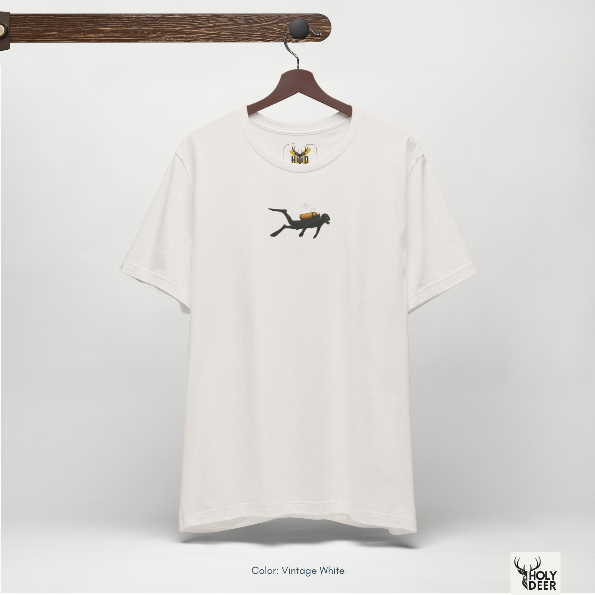 Professional flat lay photography of the Scuba Diving Shirt by Holydeer Apparel, arranged cleanly next to retro brass dive compasses, matte black depth gauges, and ocean life apparel items.