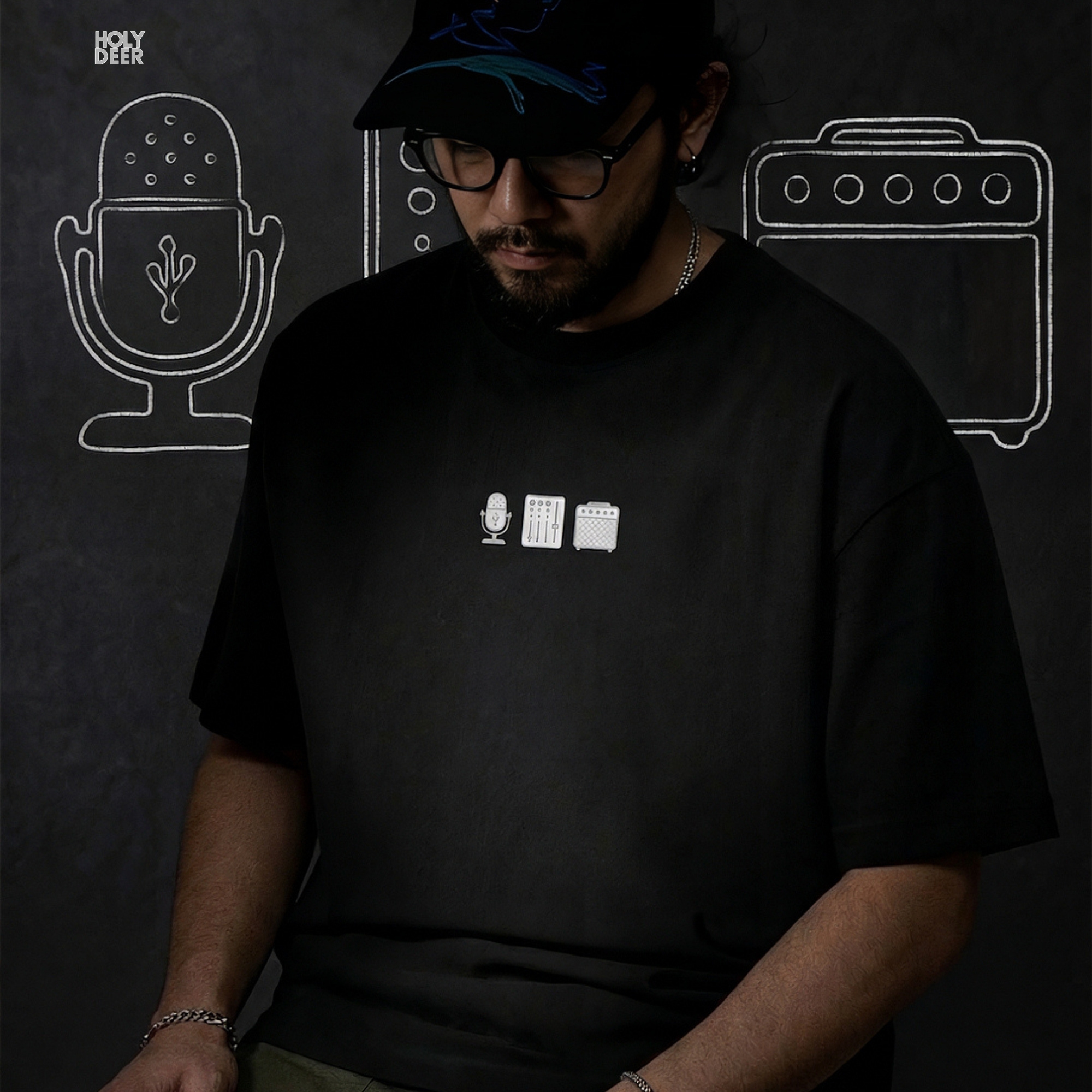Detailed macro perspective displaying the vertical fader slot tracks, small circular dial marks, and solid ivory ink lines on the studio gear shirt panel.
