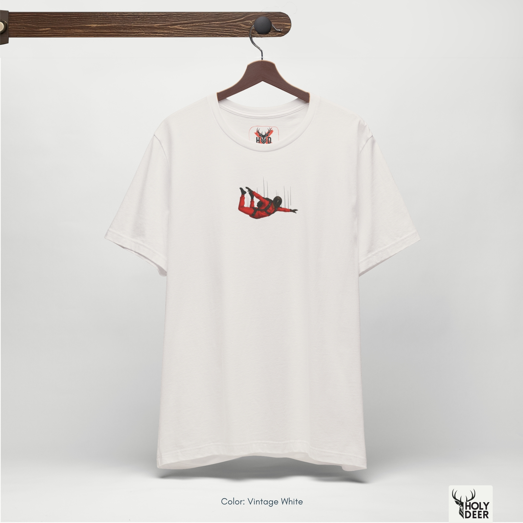 Angled perspective of the premium screen-printed Skydiving Shirt, detailing the thick paint feel of the flying skydiver silhouette and vertical speed lines, asymmetric chest placement, and the signature holydeer tee high-contrast design.