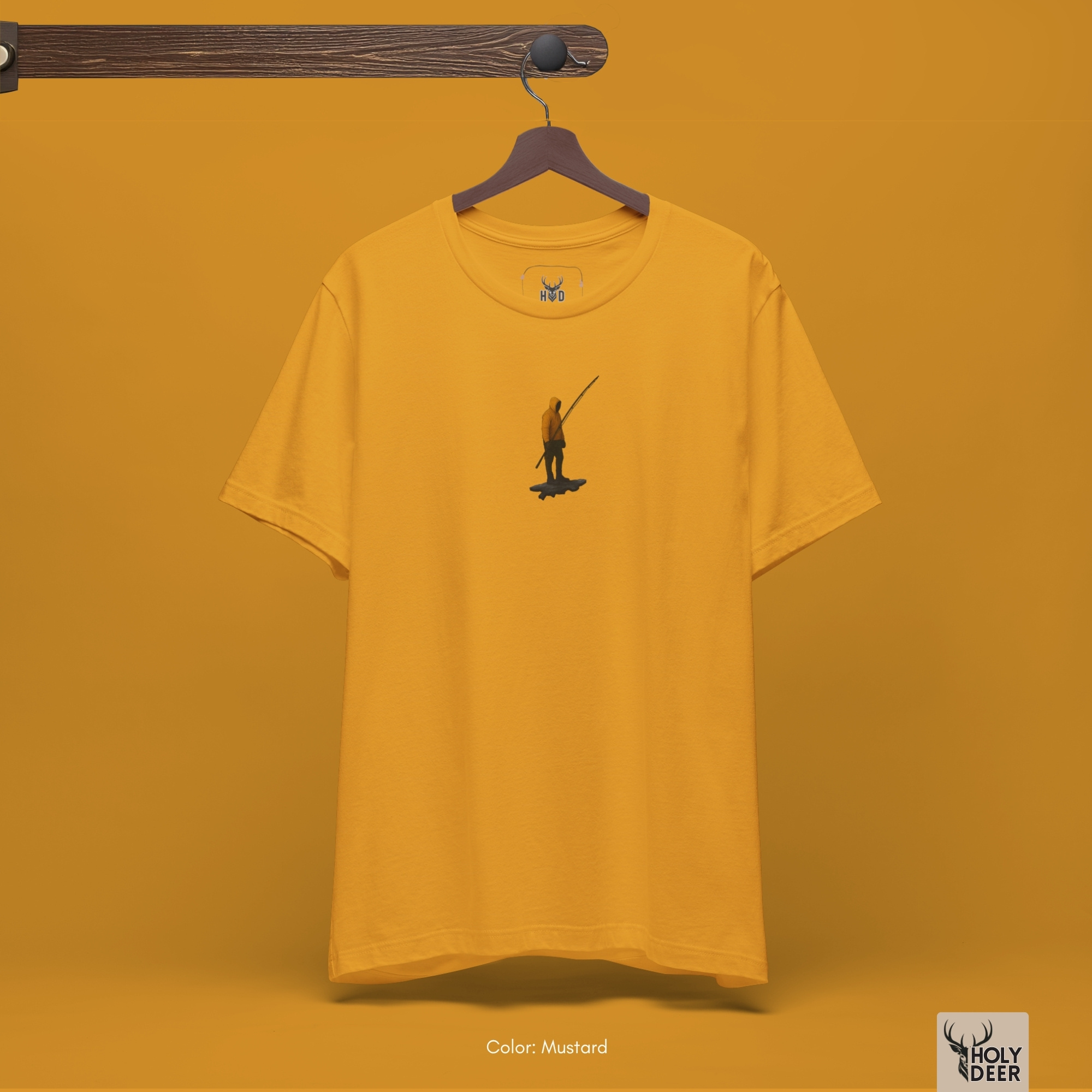 Angled perspective of the premium screen-printed Minimalist Fish Tee, detailing the thick paint feel of the floating rock platform silhouette and heavy boot details, center chest layout placement, and the signature holydeer tee high-contrast design.