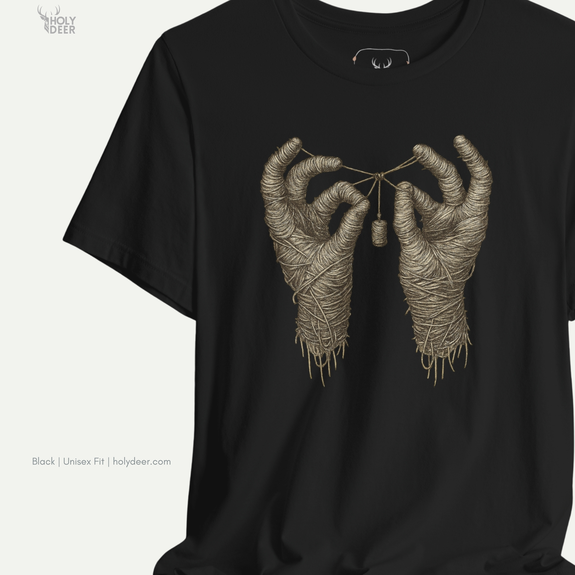 Close up macro photo of the inner collar branding stamp on the Mummy Hands Shirt, verifying original Holydeer Clothing authenticity and high-end minimalist black graphic tee boutique luxury heritage.