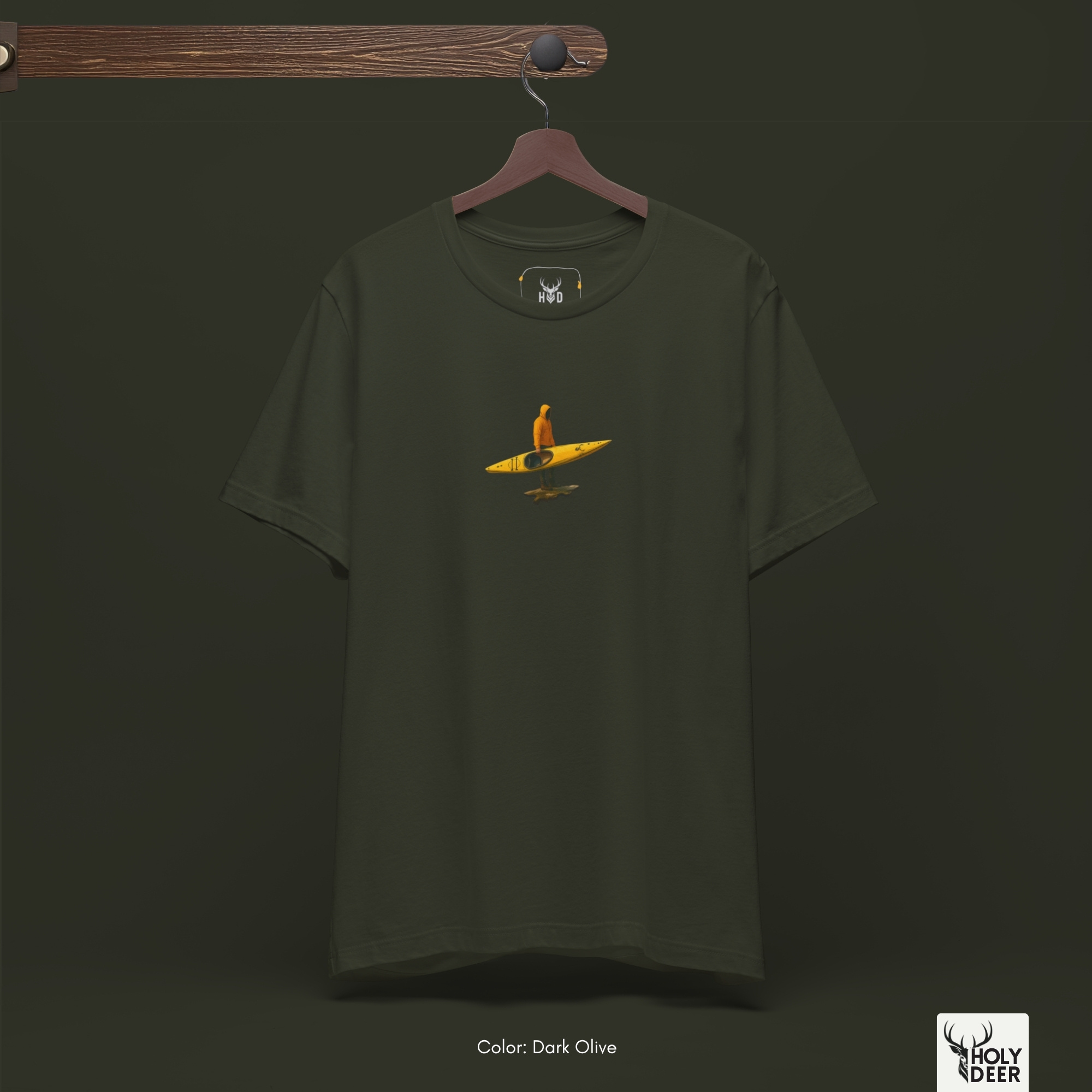 Minimalist dark backdrop focusing heavily on the standalone frame of the River Adventure Tee by Holydeer, proving it acts as a unique alternative statement piece and an essential outdoor sport tee