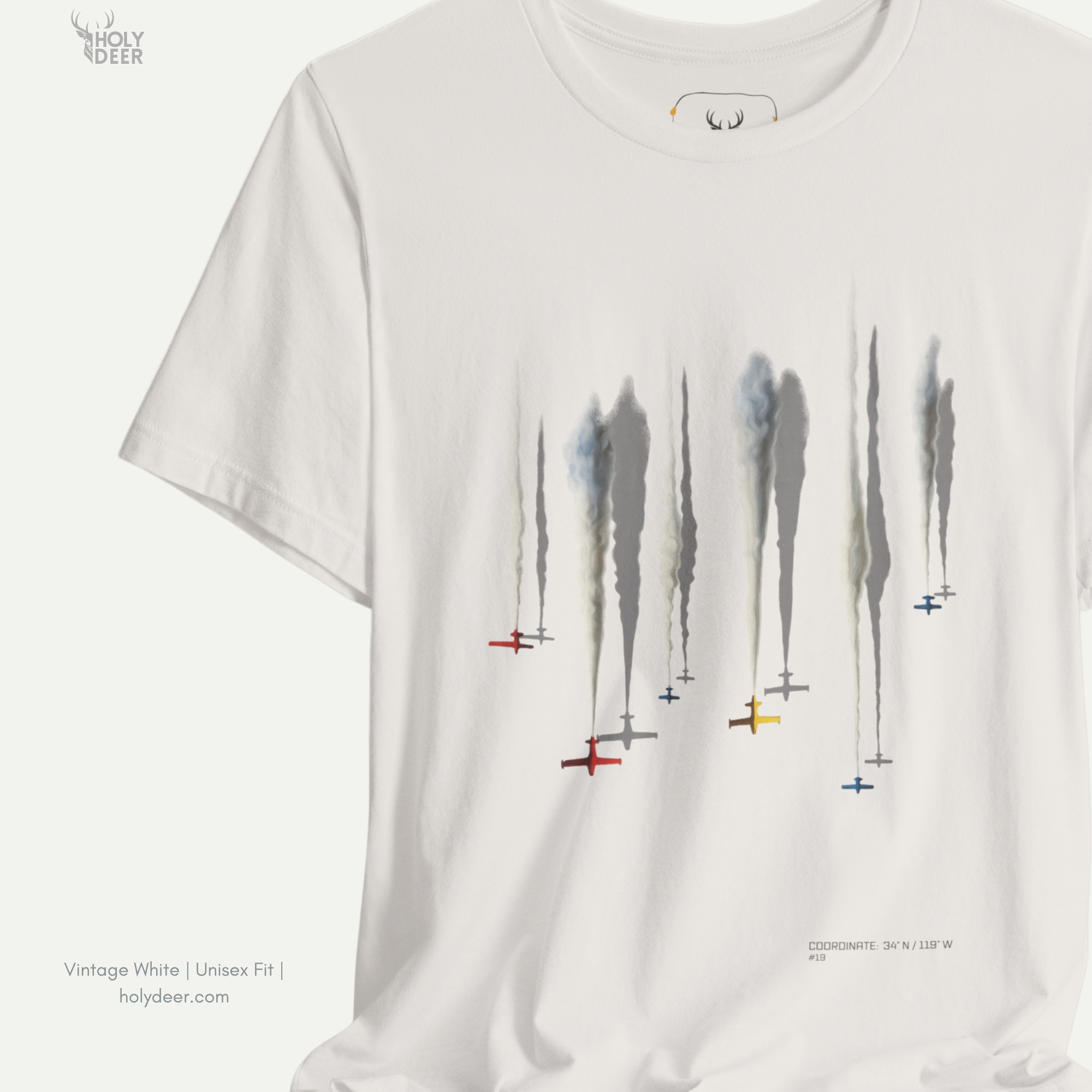 Angled perspective of the premium screen-printed Aerobatic Jets Tee, detailing the thick paint feel of the dikey kalkış lines and colorful aircraft silhouette points, layout placement, and the signature holydeer tee high-contrast design.