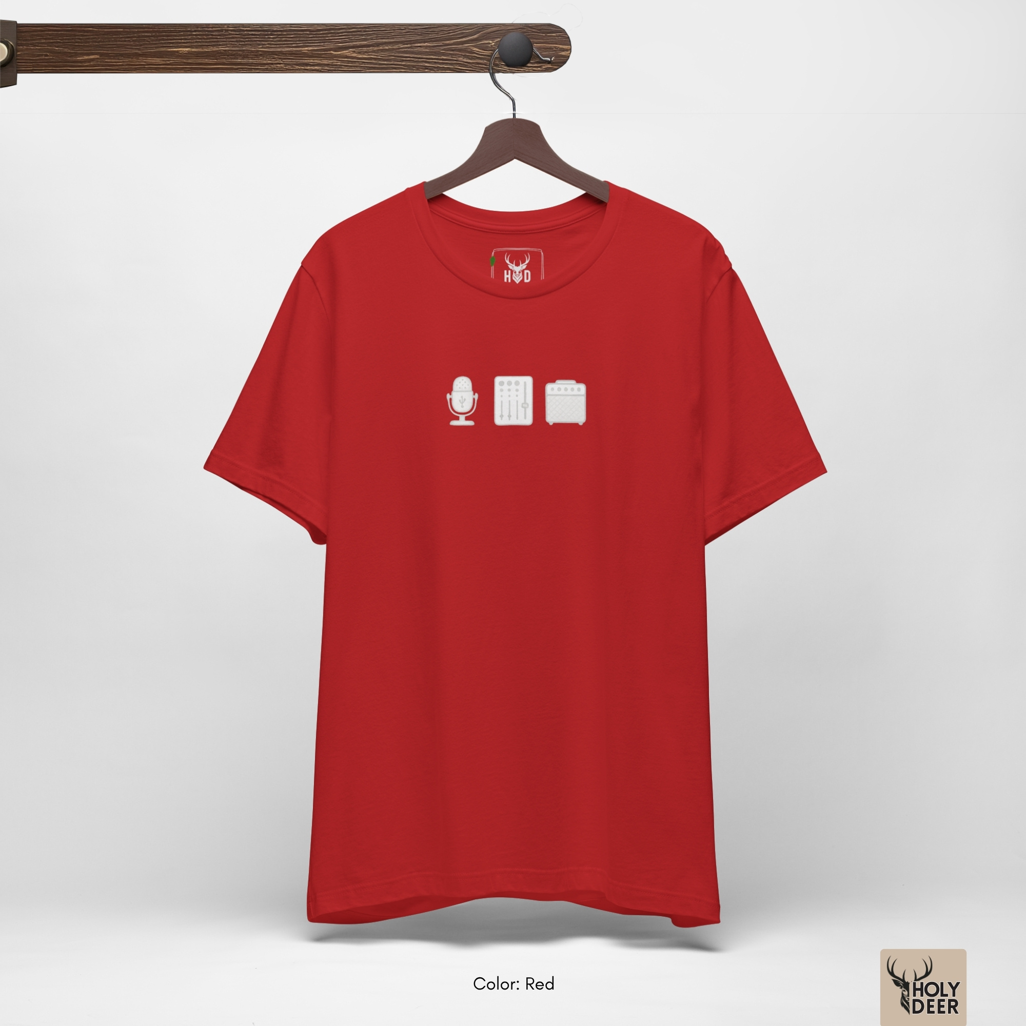 The official Holydeer sound designer tee hanging cleanly on a custom dark wood frame inside an open boutique showroom backdrop.