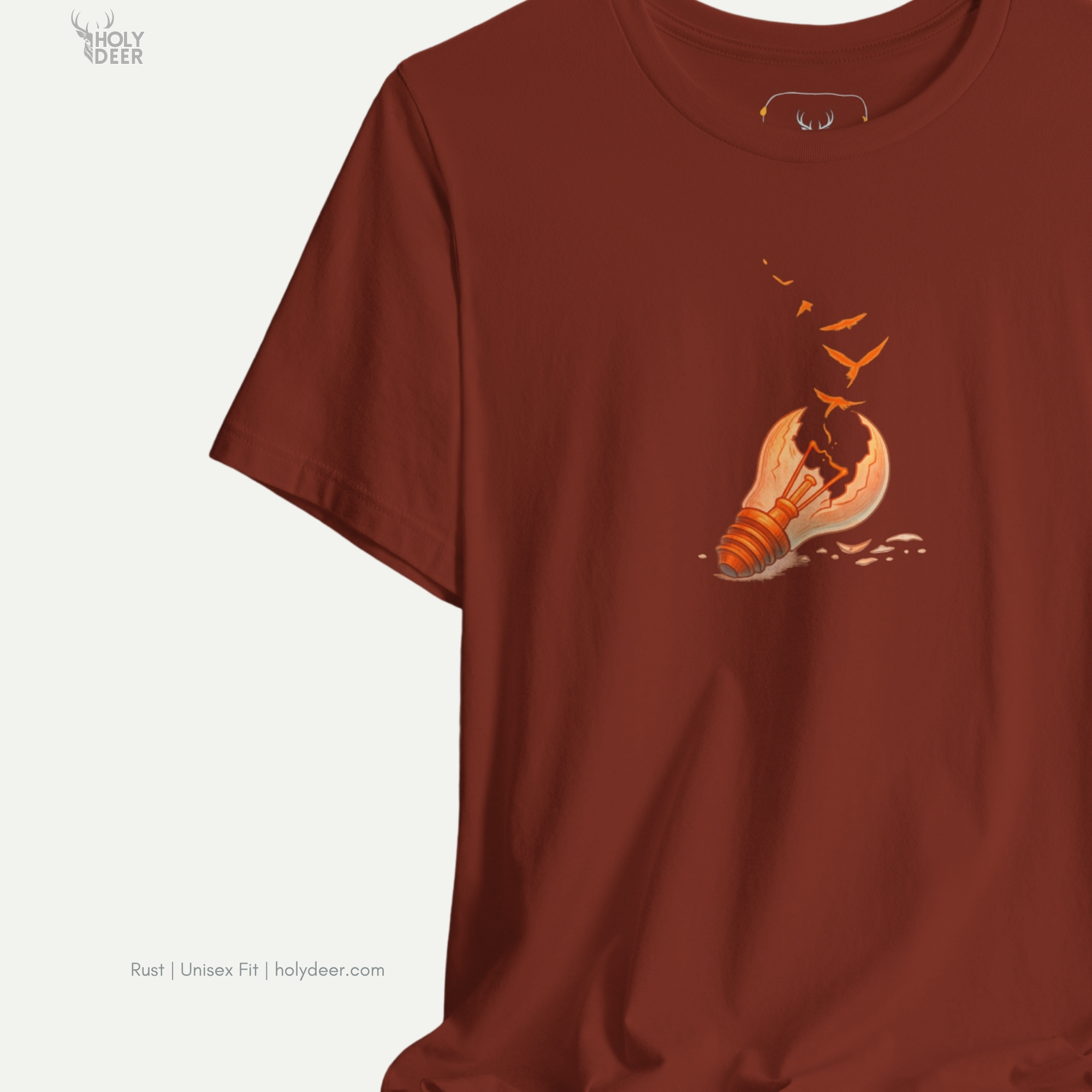 The iconic Freedom Tshirt hanging cleanly on a luxury wood hanger, highlighting the robust neckline structure, crisp asymmetric zihinsel kurtuluş layout flow, and the official holydeer.com retail tags.