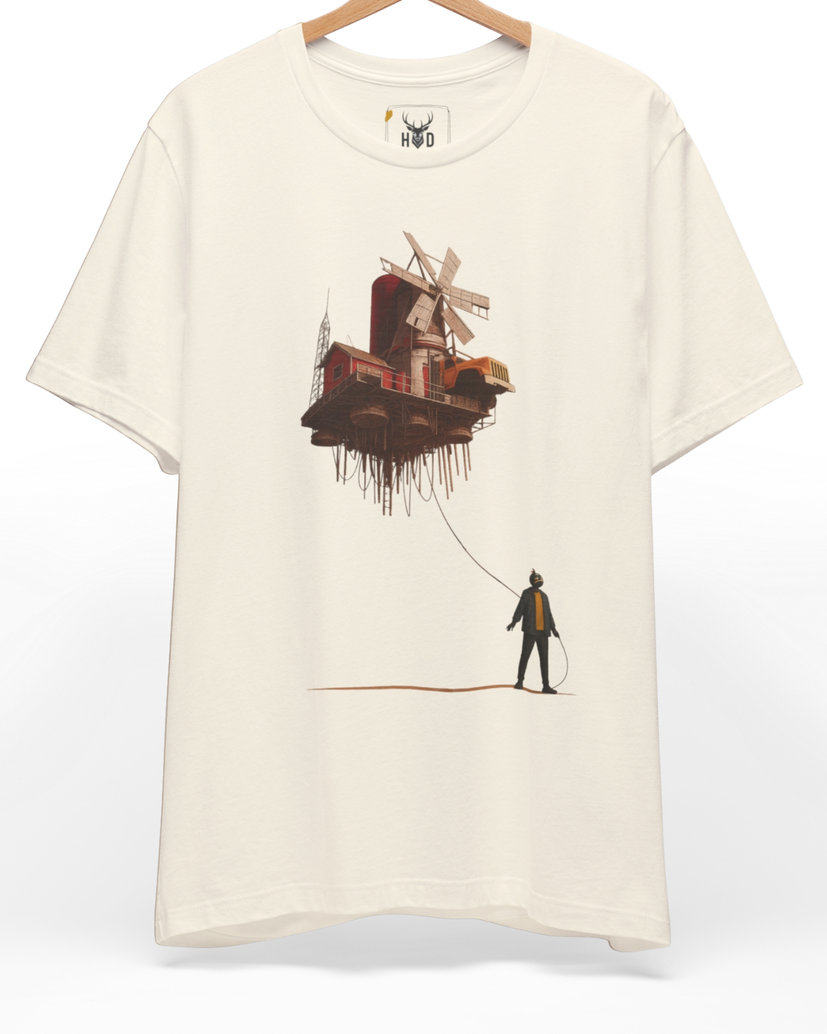 Premium Surreal Art Tshirt displaying a high-detail floating house tee and flying windmill capsule concept on a soft cream graphic shirt layout, designed by Holydeer Clothing.
