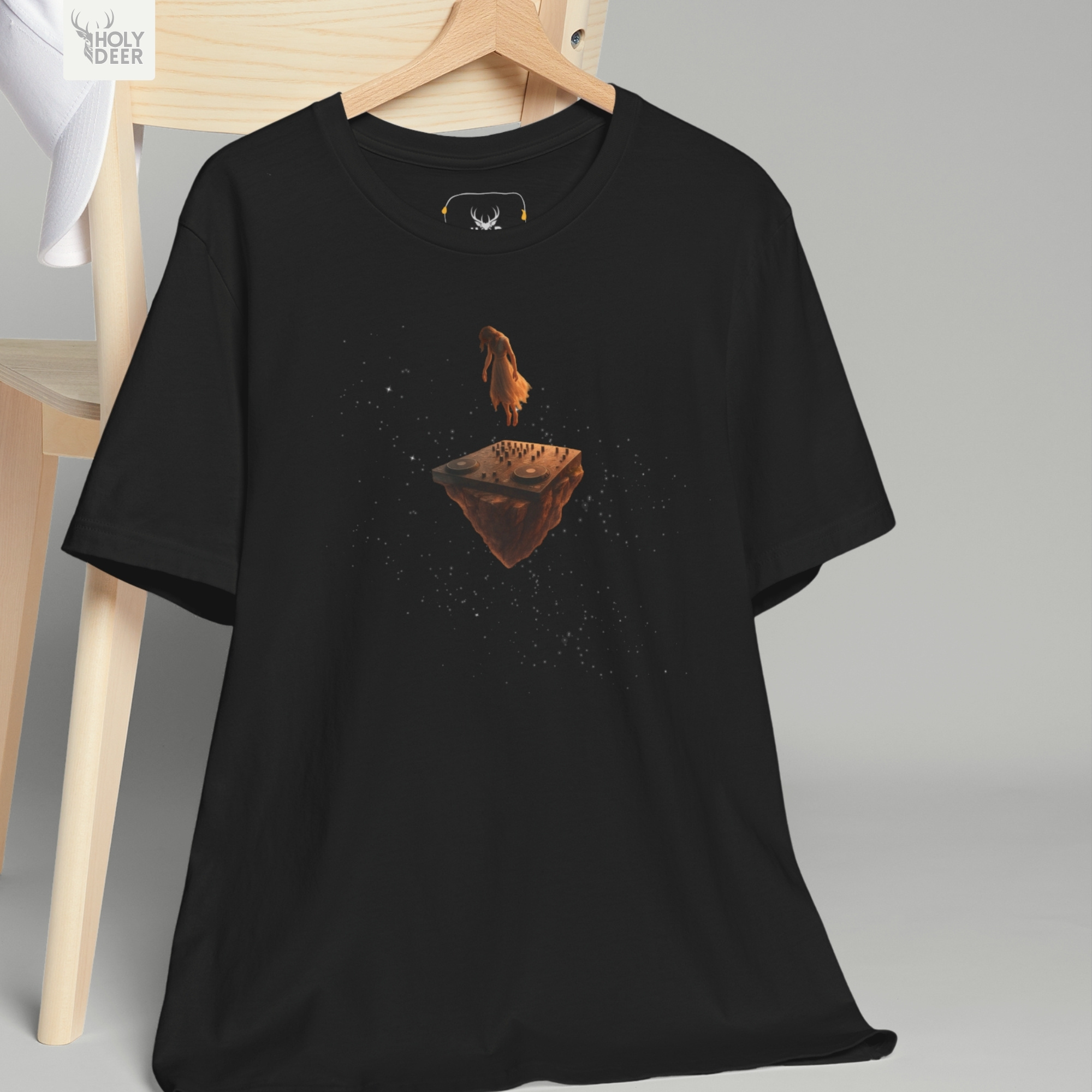 Professional flat lay photography of the Melodic Techno Shirt by Holydeer Apparel, arranged cleanly next to analog hardware mixers, deep techno vinyl plates, and premium dj gift accessories.