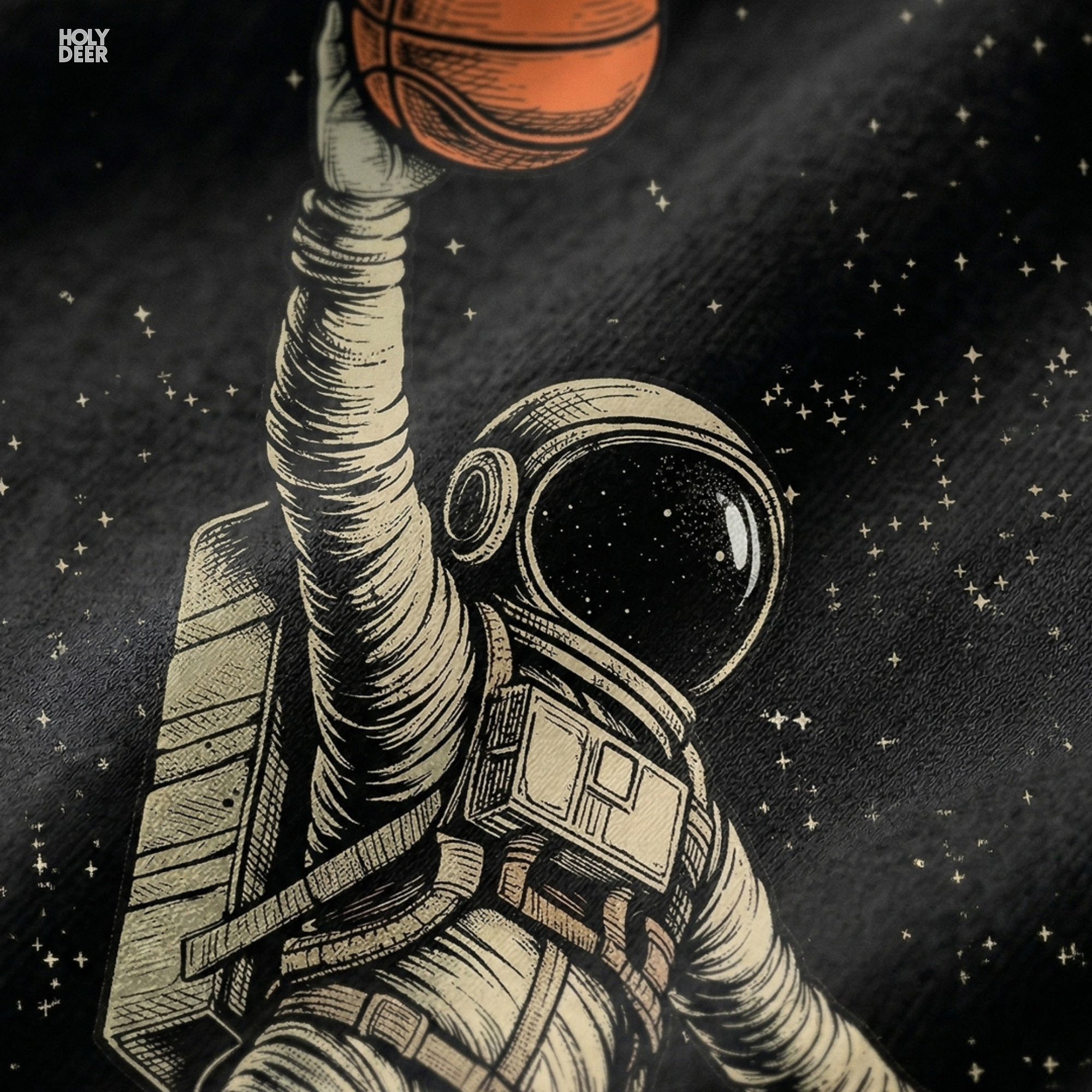 Macro view of the Cyberpunk Basketball print showcasing intricate ink line-hatching on the heavy protective spacesuit, vibrant orange basketball graphic, and fine galaxy stars dust fields crafted exclusively by Holydeer Streetwear.