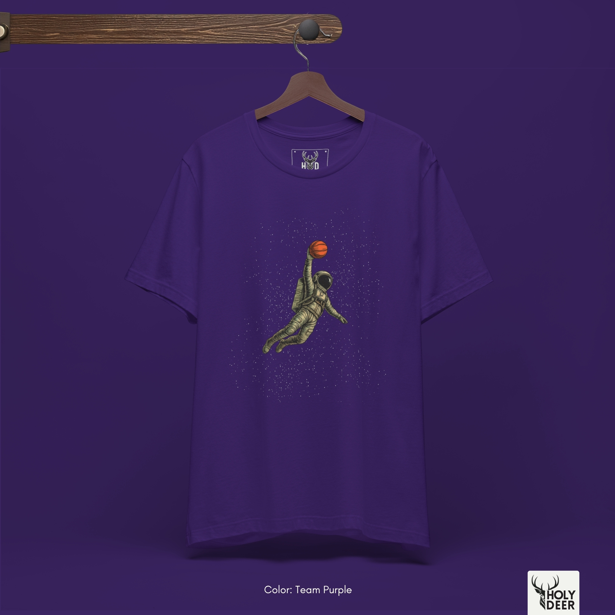 Macro view of the fine line-art details and clean contrast shading on the curved oxygen liftoff pack and intricate suit strap buckles embedded in the Cyberpunk Basketball artwork, showing the print depth that separates this holydeer tee from generic products.