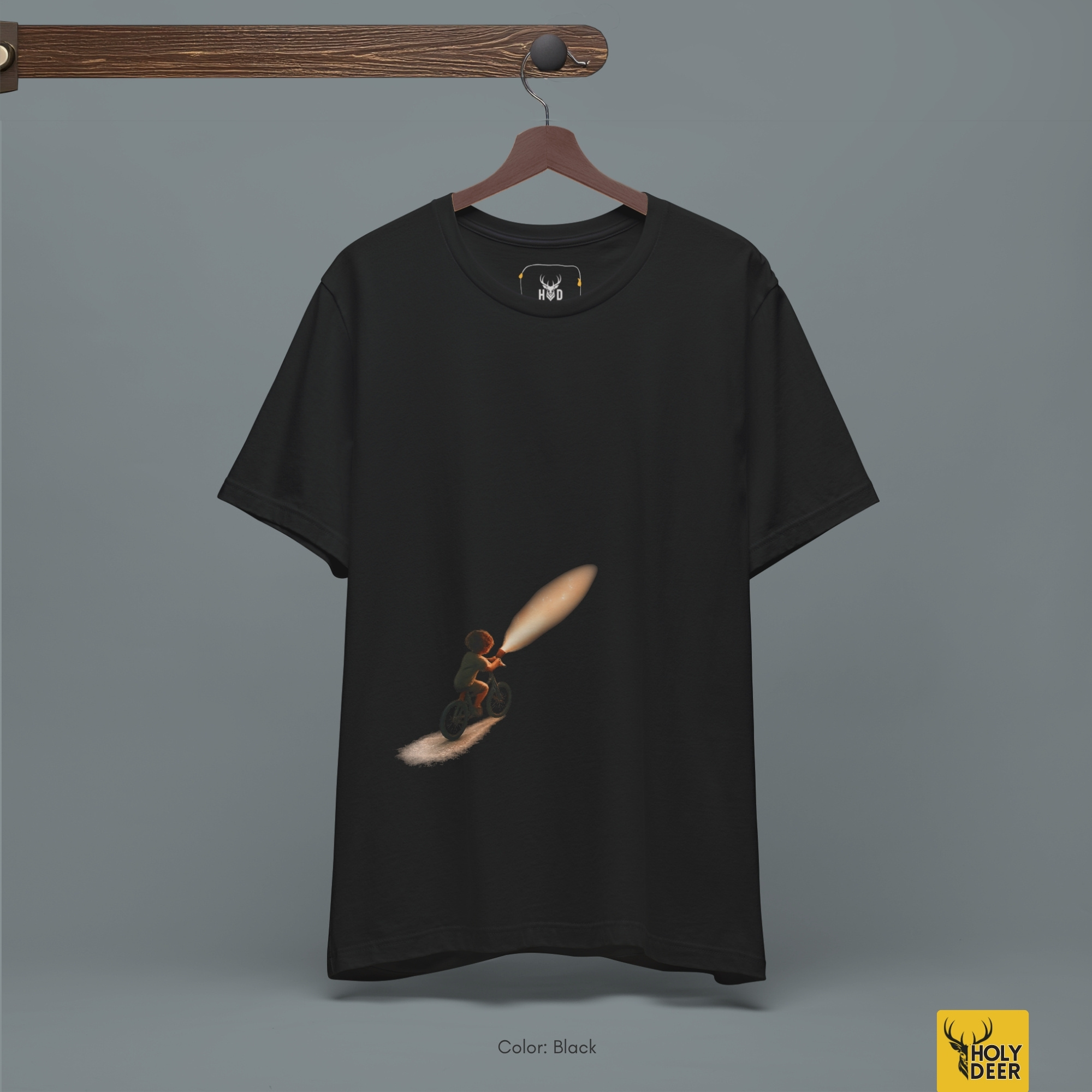 Soft pastel shadow studio backdrop framing the unique Minimalist Dream Bike Tee by Holydeer Streetwear, magnifying the clean off-centered dream bike tee placement and premium unique graphic tee presentation.