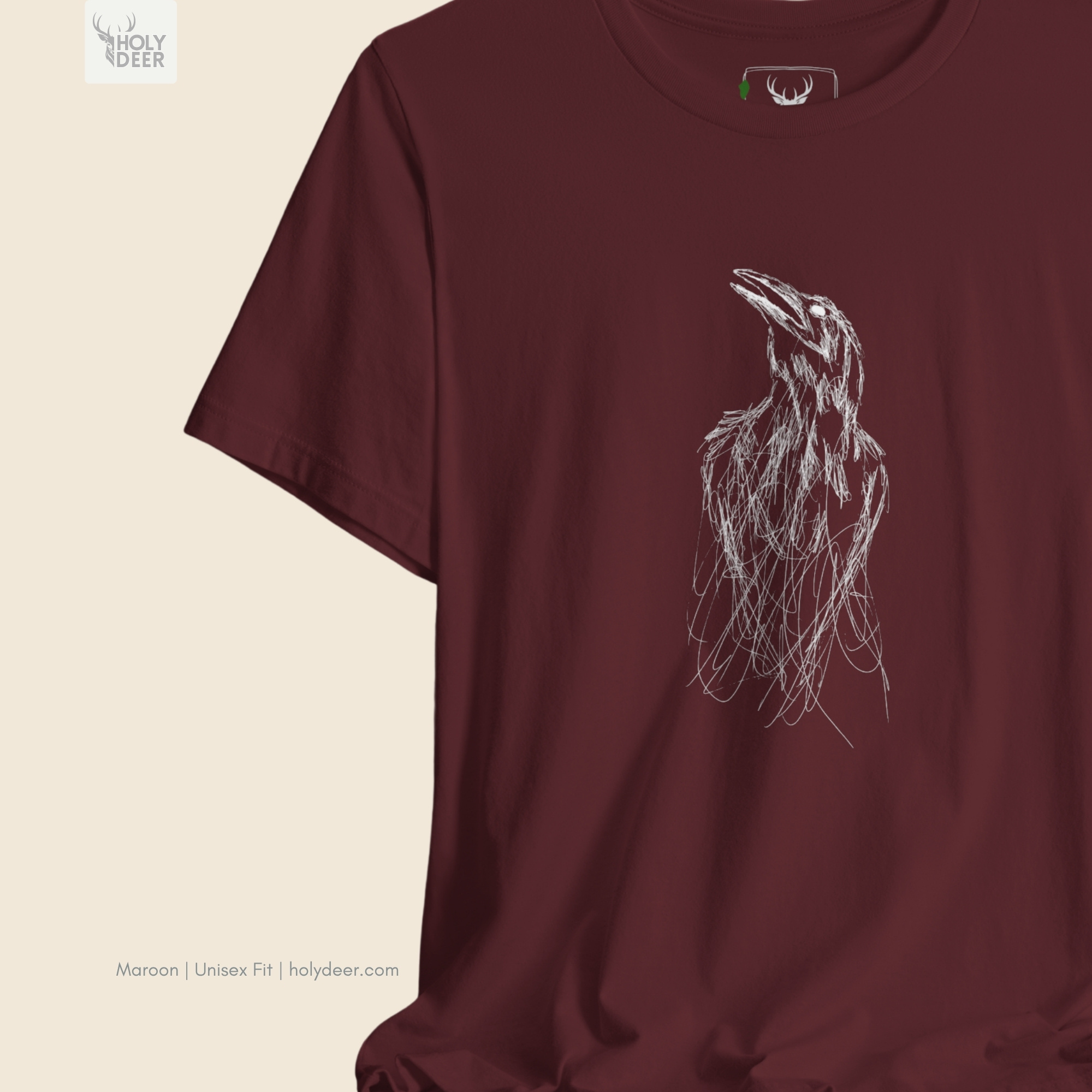 High-magnification print detail capturing the dense white hatch marks framing the calling beak, sharp skull crown boundaries, and textured ink overlaps of the gothic crow tee.