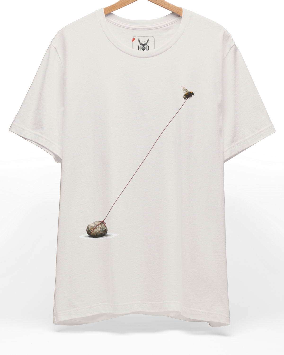 An overhead perspective displaying the bee-tshirt-minimalist-bee-tee-bee-graphic-tee-nature-tshirt-aesthetic.jpg artwork centered on a premium organic cotton backdrop by Holydeer Clothing.