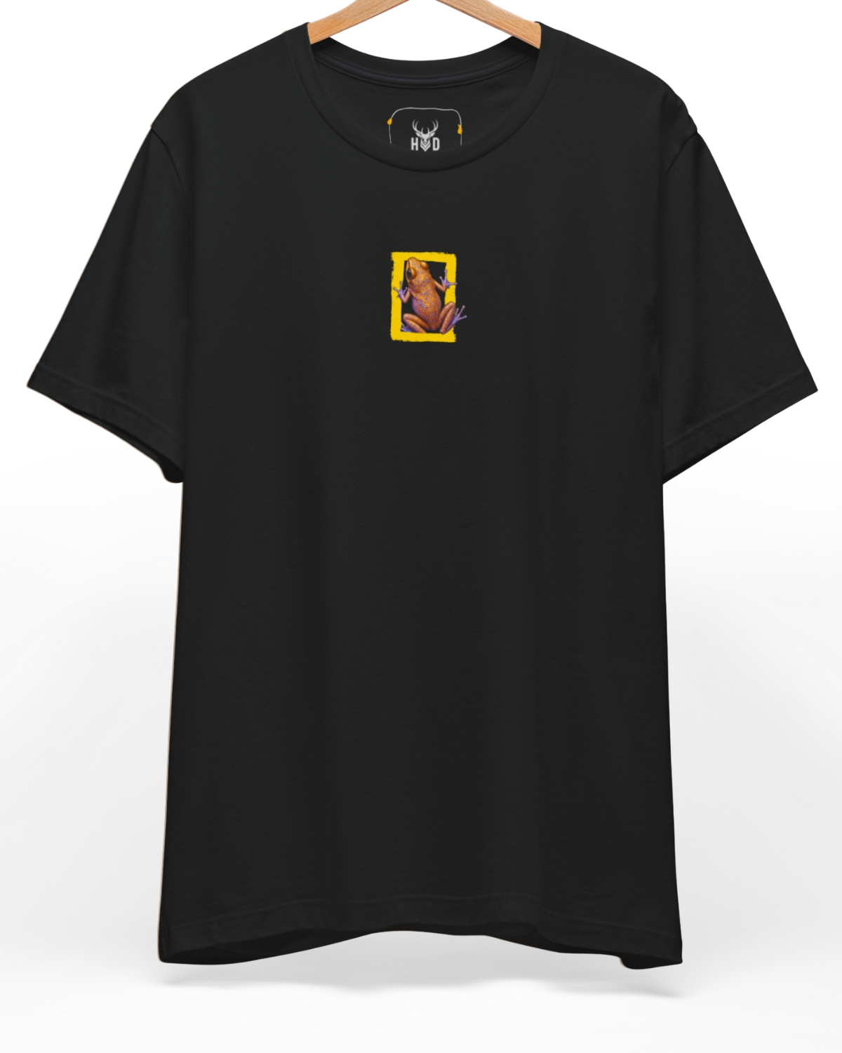 An eye-level studio presentation highlighting the modern-streetwear-graphic-frog-black-essential-apparel-holydeer-limited-series-top.jpg artwork offset on a premium combed teal canvas by Holydeer Clothing.