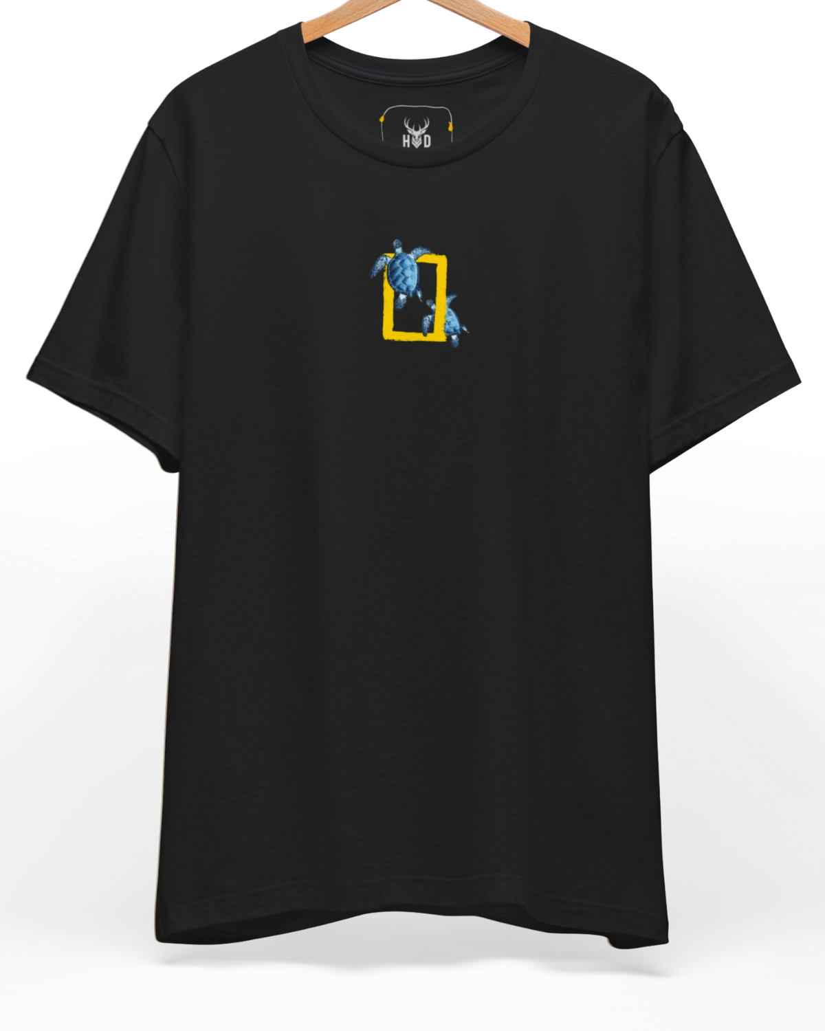 An eye-level studio presentation highlighting the aesthetic-sea-art-tshirt-wildlife-photo-design-black-aesthetic-holydeer-boutique-quality.jpg artwork offset on a premium combed teal canvas by Holydeer Clothing.