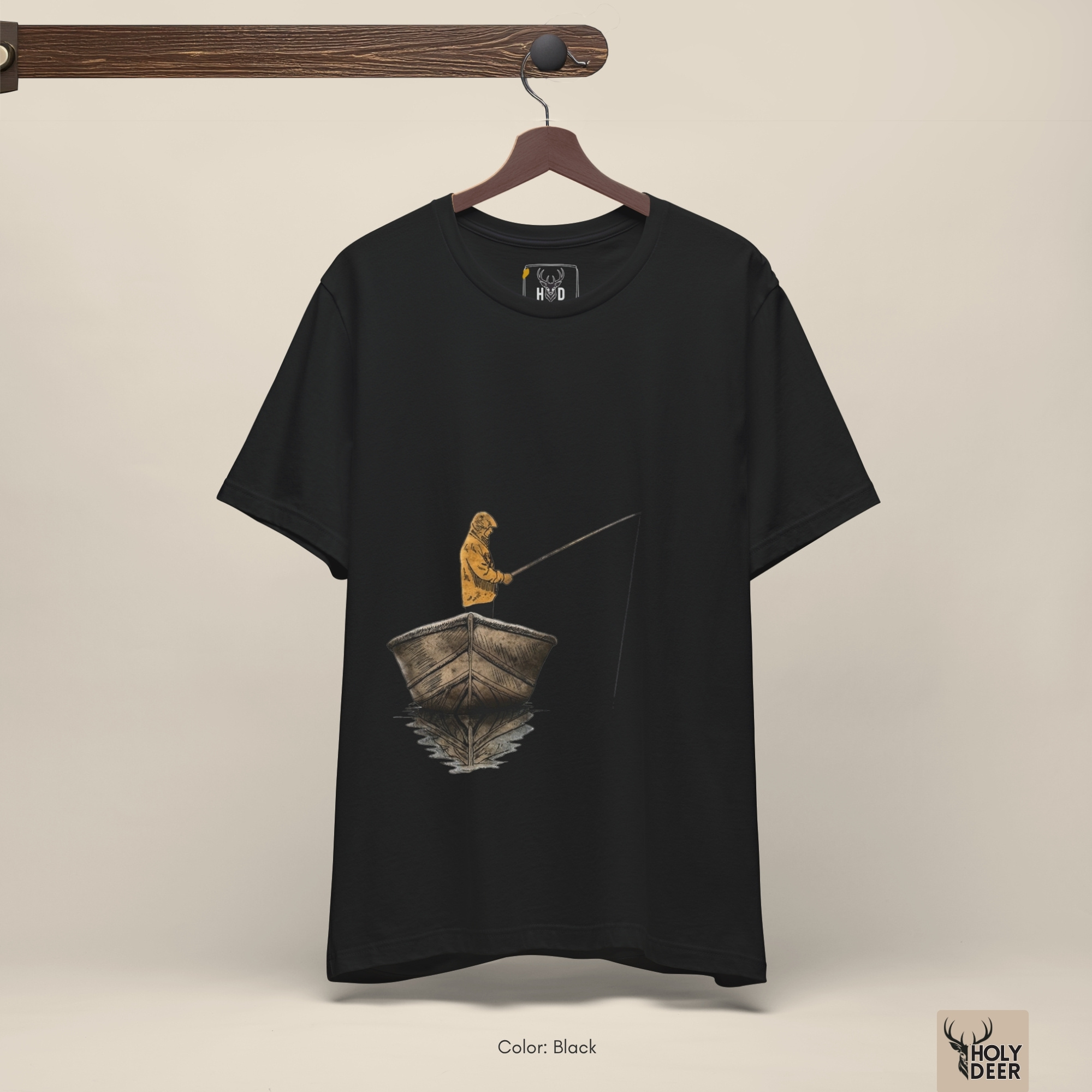 Soft shadow studio backdrop framing the unique fishing tshirt by Holydeer Streetwear, magnifying the clean off-centered boat graphic tee placement and premium solitude tee presentation.