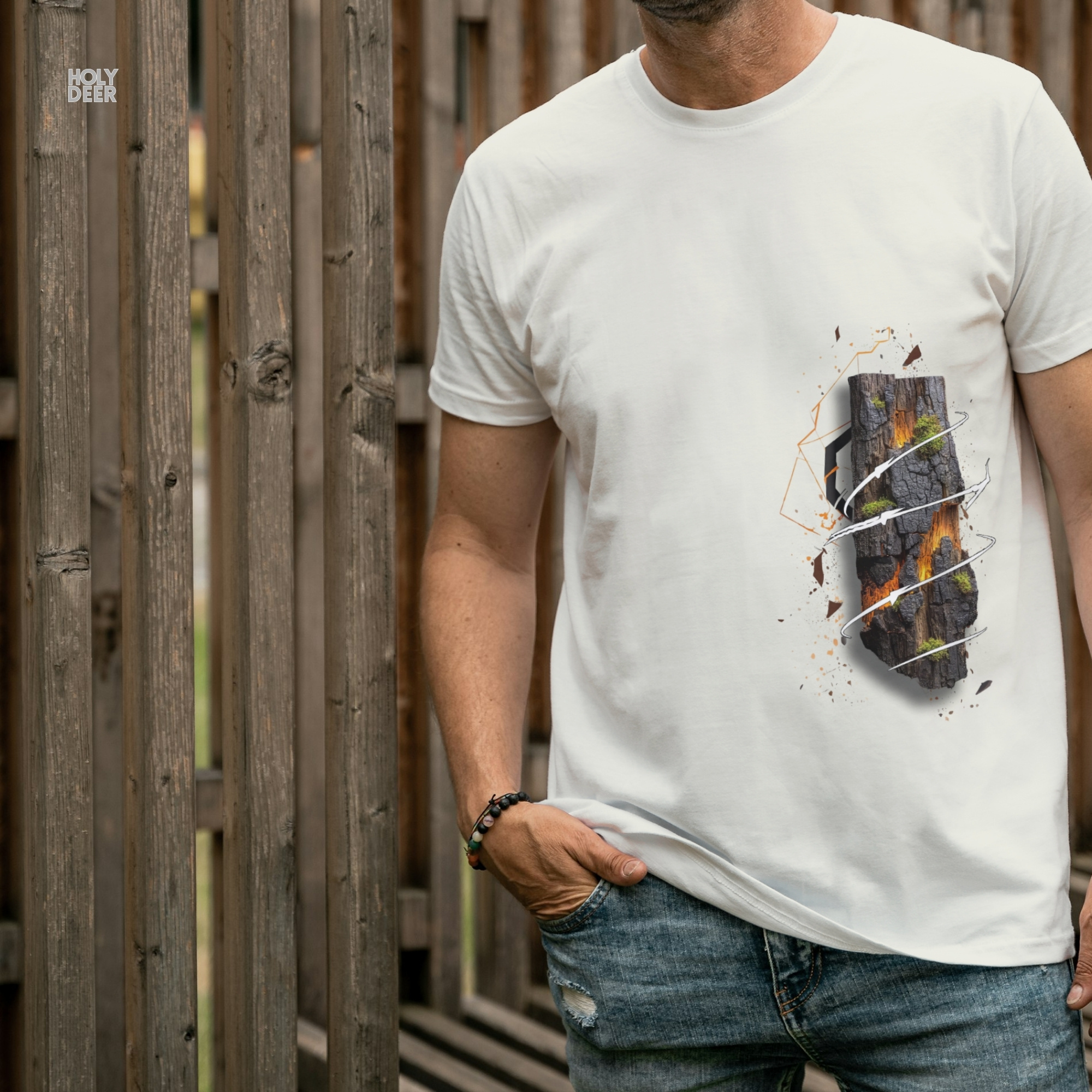 Modern brutalist industrial quarry concrete block architecture outdoor lifestyle model wearing the centered Lava Rock Tshirt from Holydeer Clothing, standing as a rugged style tee statement matching elite earth core tee trends.