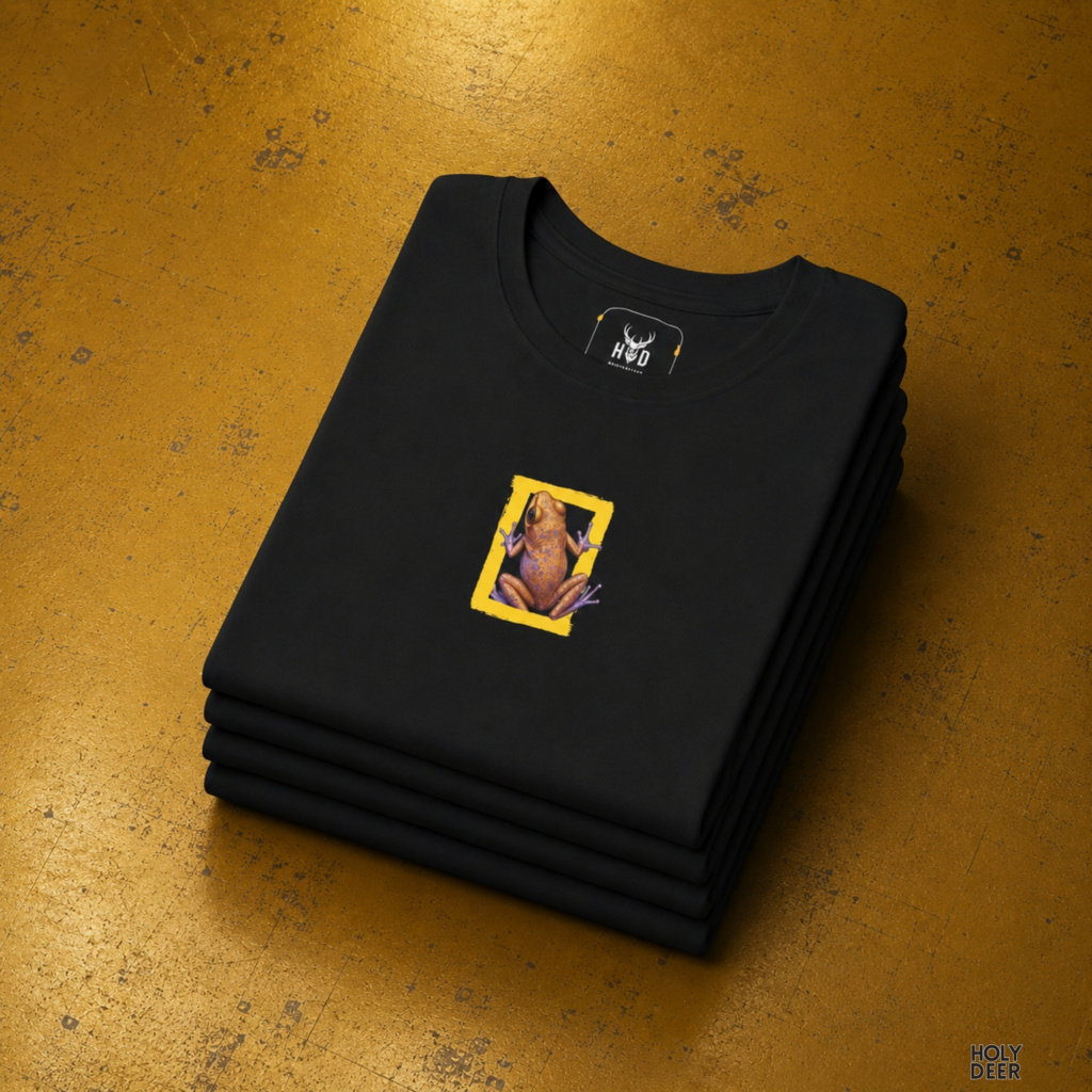 Technical close-up highlighting the thick acrylic paint textures, rough bristle marks, and iconic yellow ink anchoring the center of the wildlife photo tee.