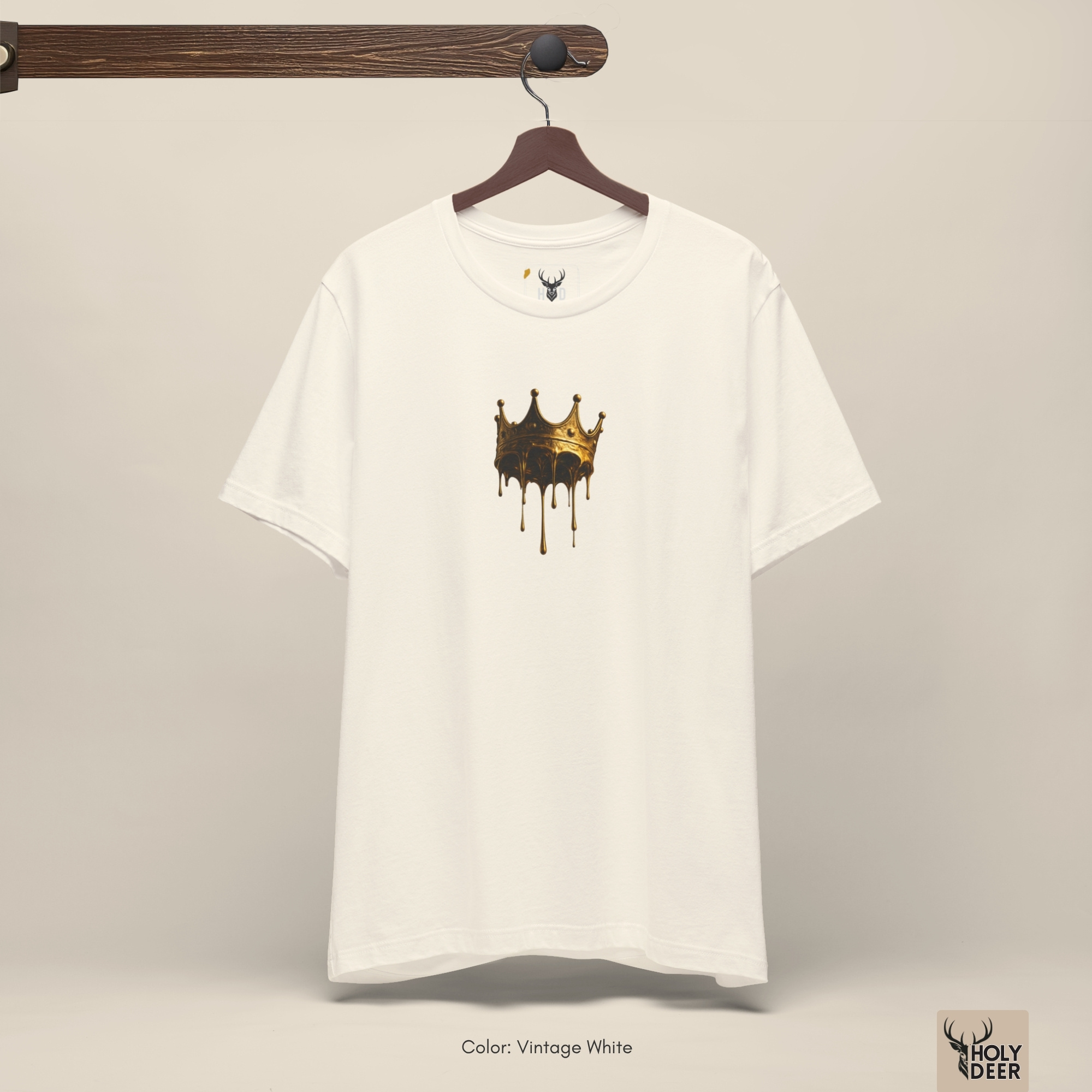 Soft golden ray shadow studio backdrop framing the unique Drip Crown Tee by Holydeer Streetwear, magnifying the clean centered crown graphic tee placement and premium luxury graphic tee presentation.