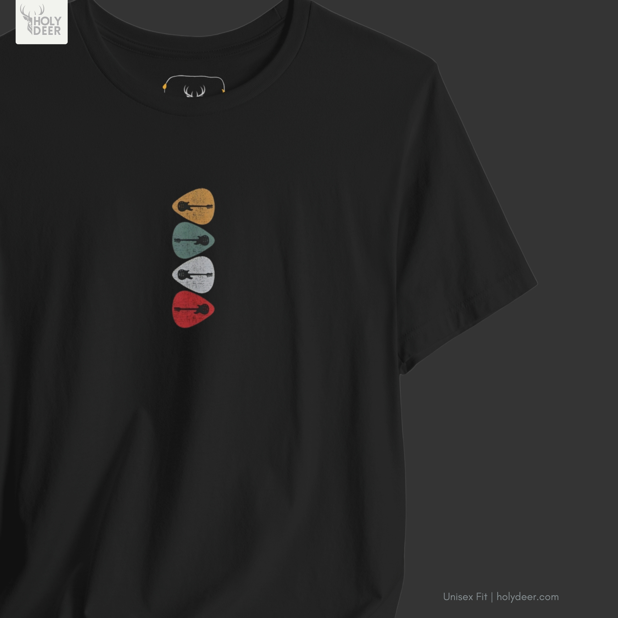 Angled perspective of the premium screen-printed Retro Guitar Shirt, detailing the thick ink feel of the retro red and yellow guitar picks, centered vertical layout placement, and the signature holydeer tee high-contrast design.