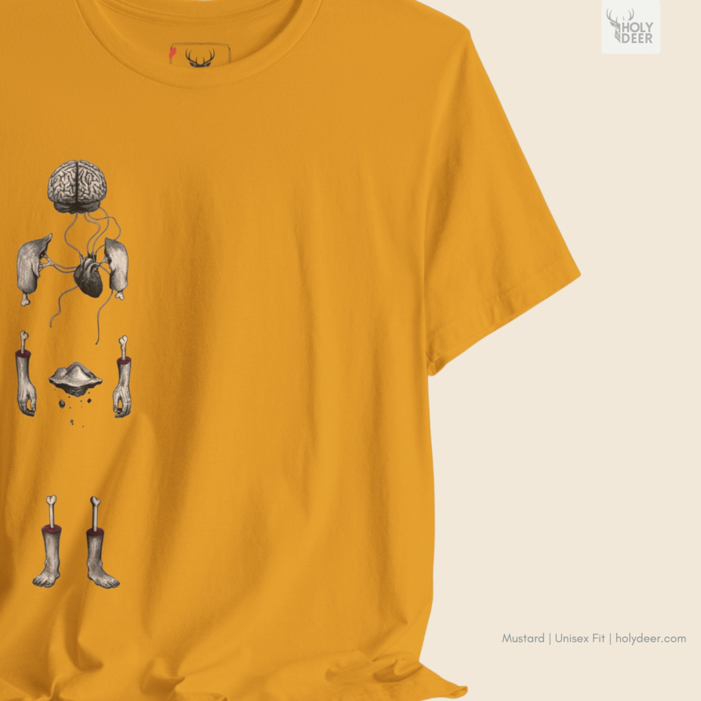 Professional flat lay photography of the Surreal Anatomy Tee by Holydeer Apparel, arranged cleanly next to vintage human anatomy sketchbooks, matte black fountain pens, and premium weirdcore tshirt items.