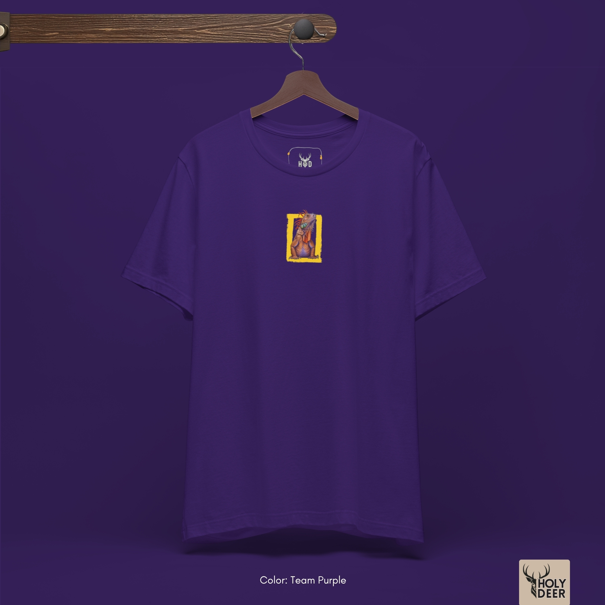 Technical close-up highlighting the thick acrylic paint textures, rough bristle marks, and iconic yellow ink anchoring the center of the wildlife photo tee.