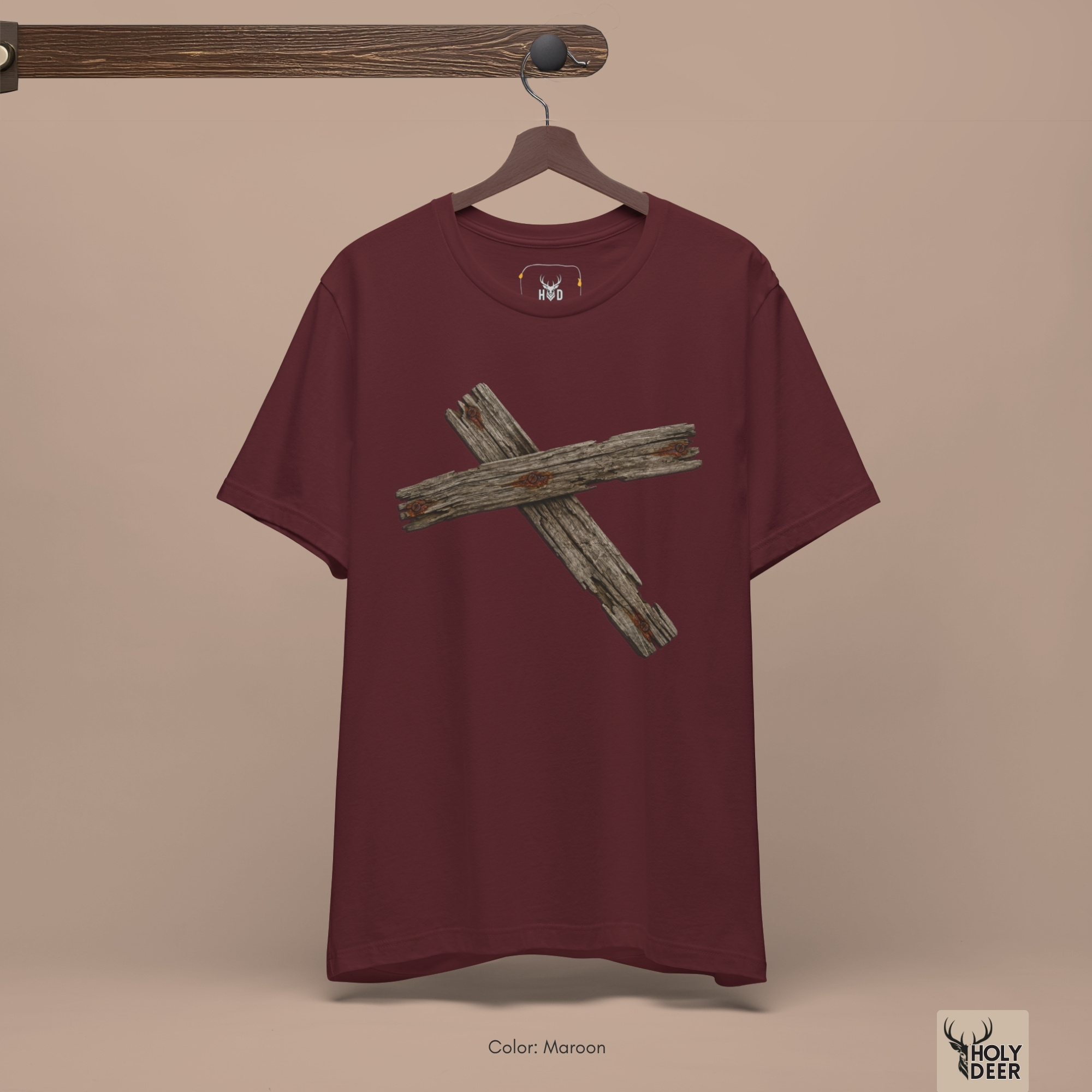 Angled perspective of the premium screen-printed Wooden Cross Tshirt, detailing the thick paint feel of the layered overlapping wood planks layout and fine grain split vectors, center layout placement, and the signature holydeer tee high-contrast design.