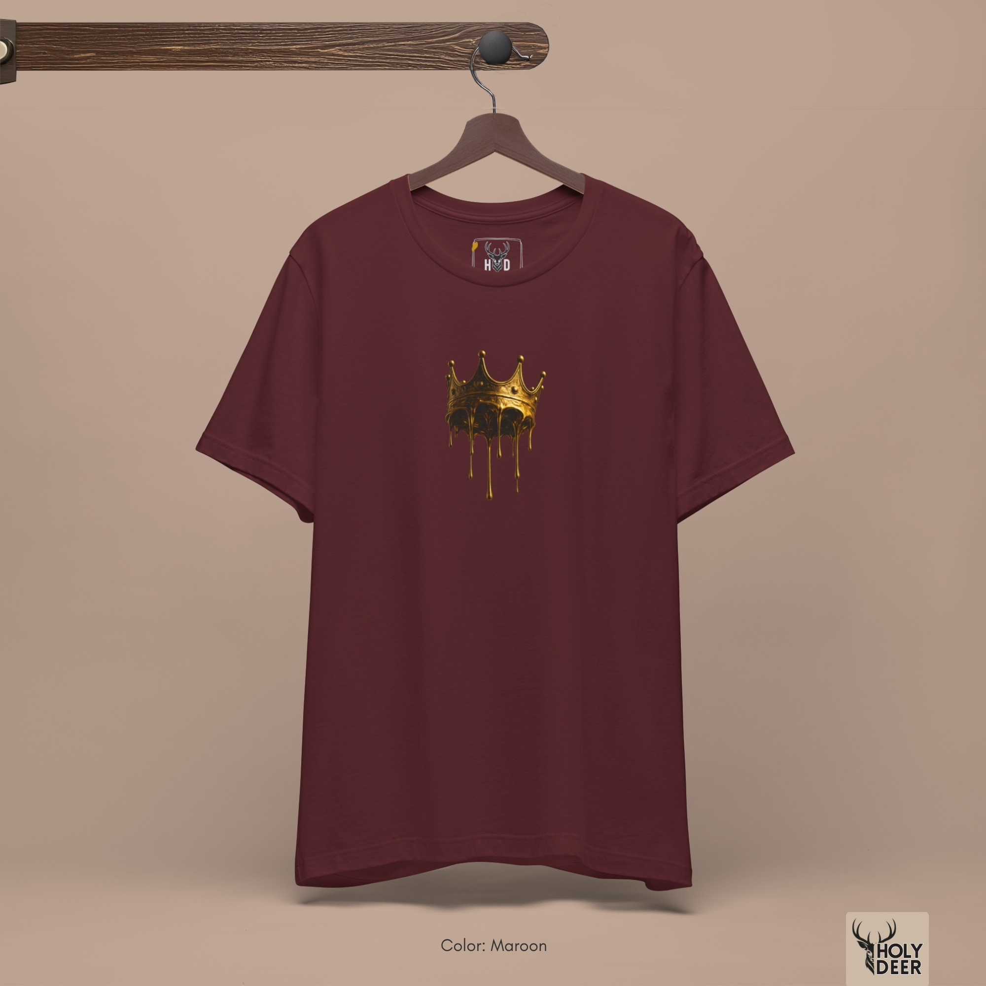 Professional flat lay photography of the Drip Crown Tee by Holydeer Apparel, arranged cleanly next to brushed gold chronographs, minimalist black sunglasses, and premium royal aesthetic tee items.
