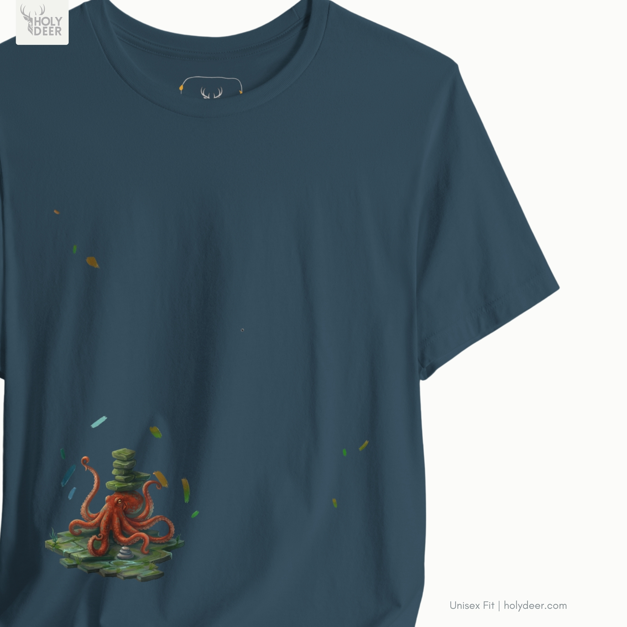 High-magnification print detail capturing the textured green meditation stones stacked perfectly atop the orange cephalopod skull of the yoga octopus shirt.