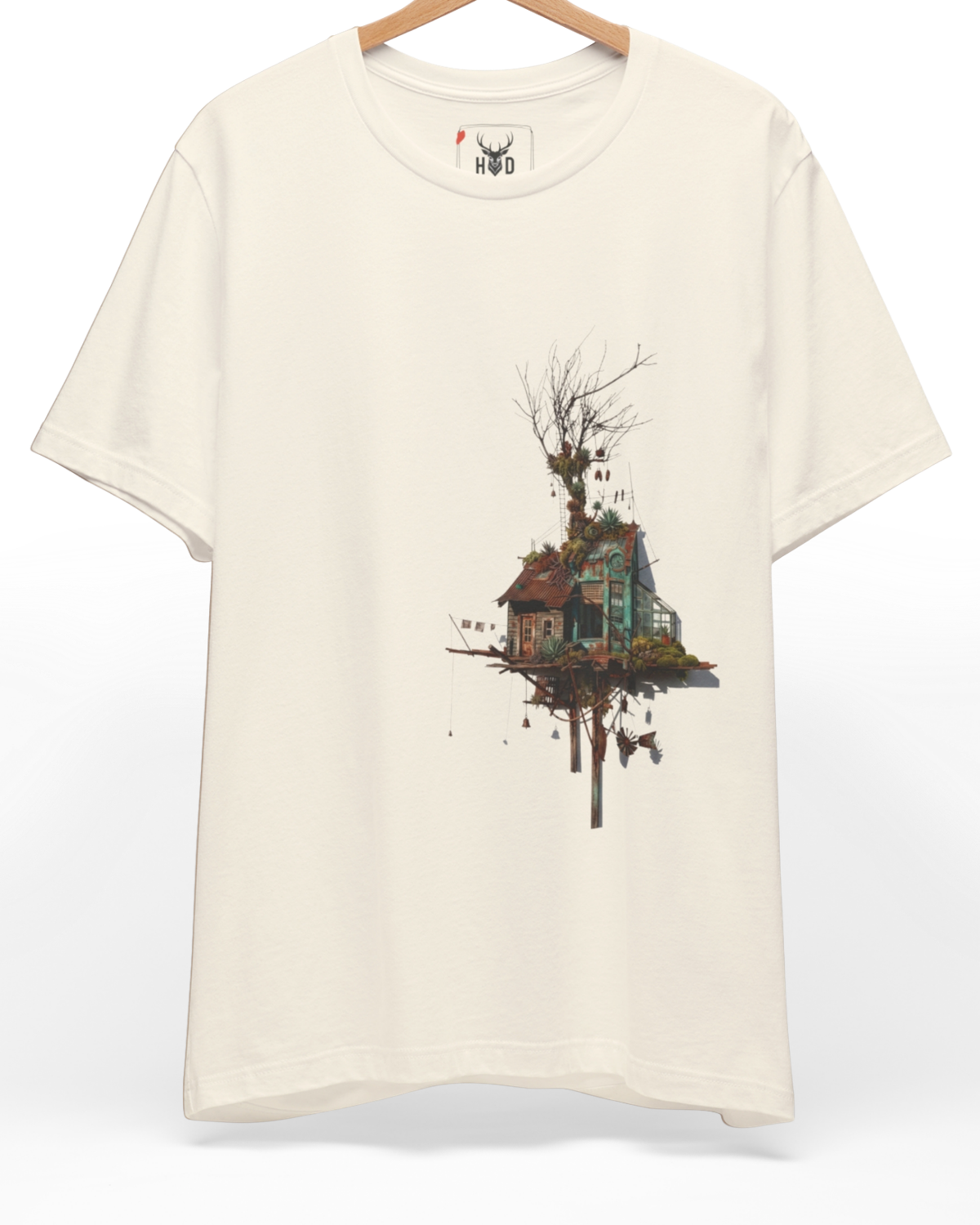 An eye-level studio presentation highlighting the tree-house-shirt-treehouse-tshirt-floating-house-tee-surreal-house-tee.jpg artwork centered on a premium combed cotton canvas by Holydeer Clothing.