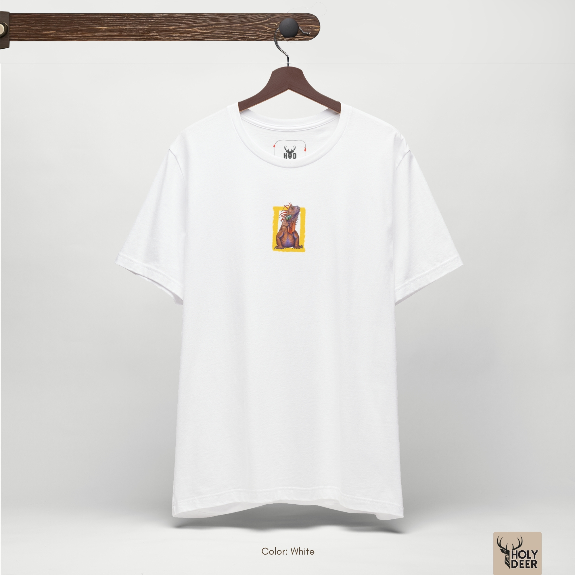 The official Holydeer black graphic tee hanging inside a clean, unpolished wood-accented retail space or premium home collection.