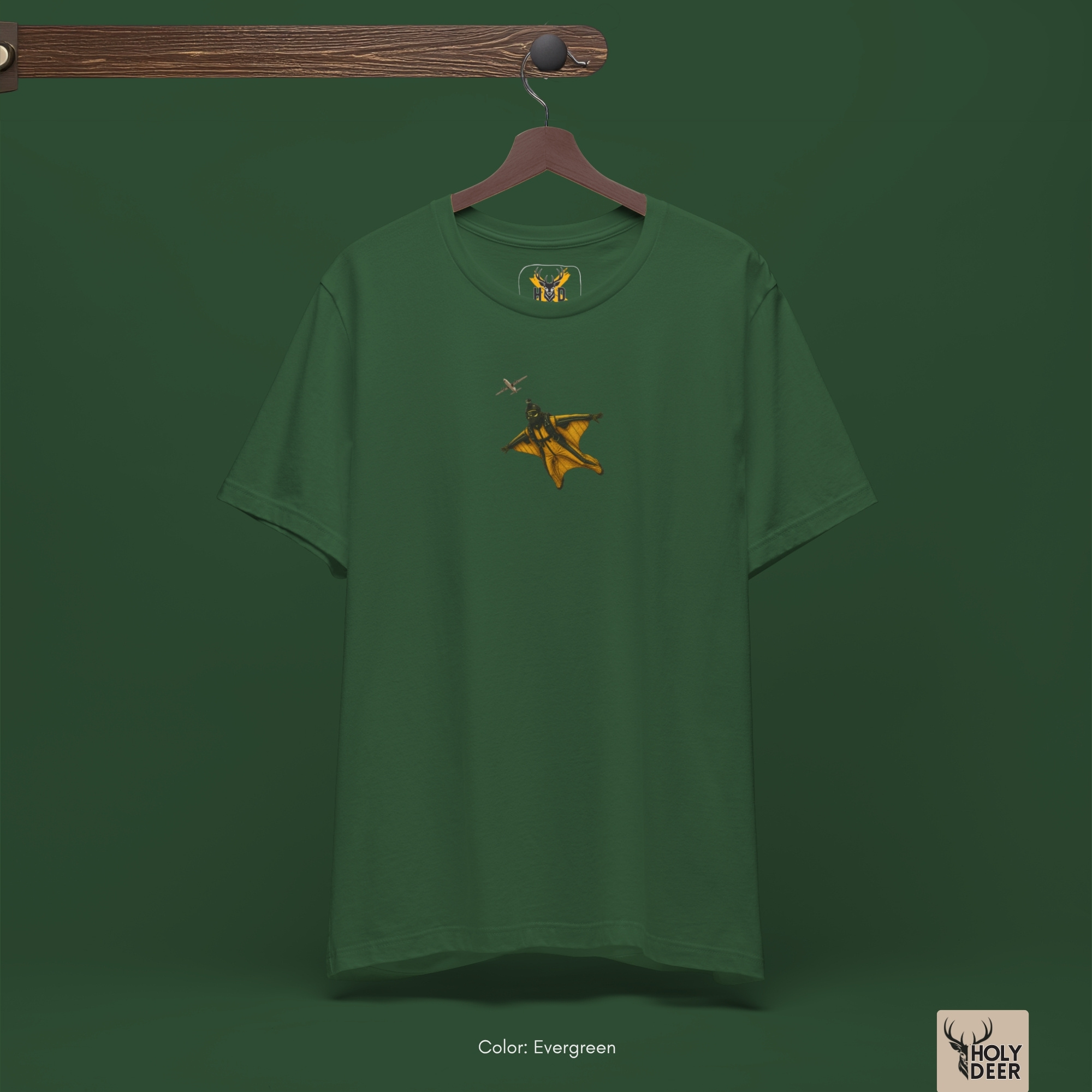 Minimalist dark backdrop focusing heavily on the standalone silhouette of the Wingsuit Pilot Tee by Holydeer, proving it acts as a unique athlete gift and an essential skydiver apparel piece.