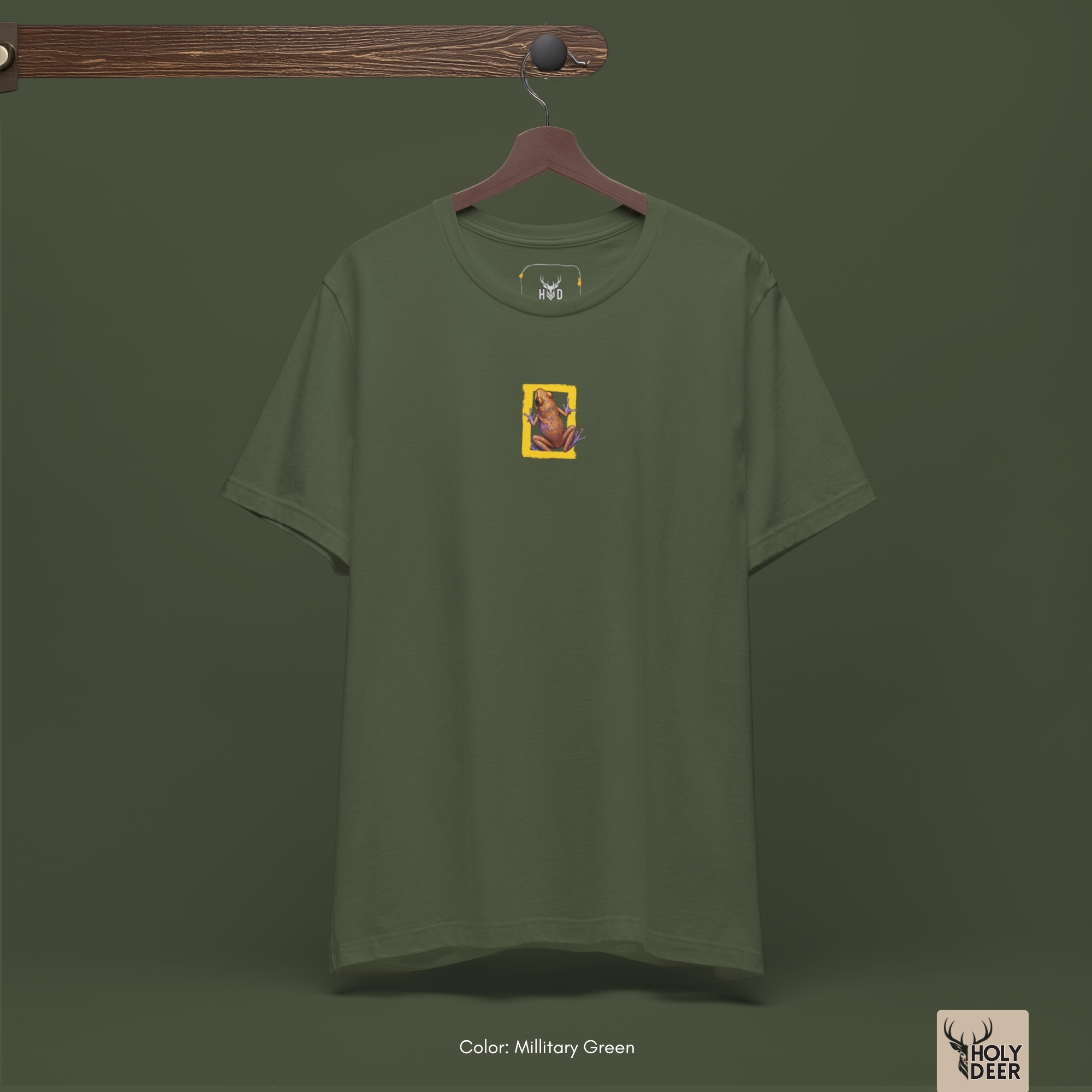 The official Holydeer black graphic tee hanging inside a clean, unpolished wood-accented retail space or premium home collection.